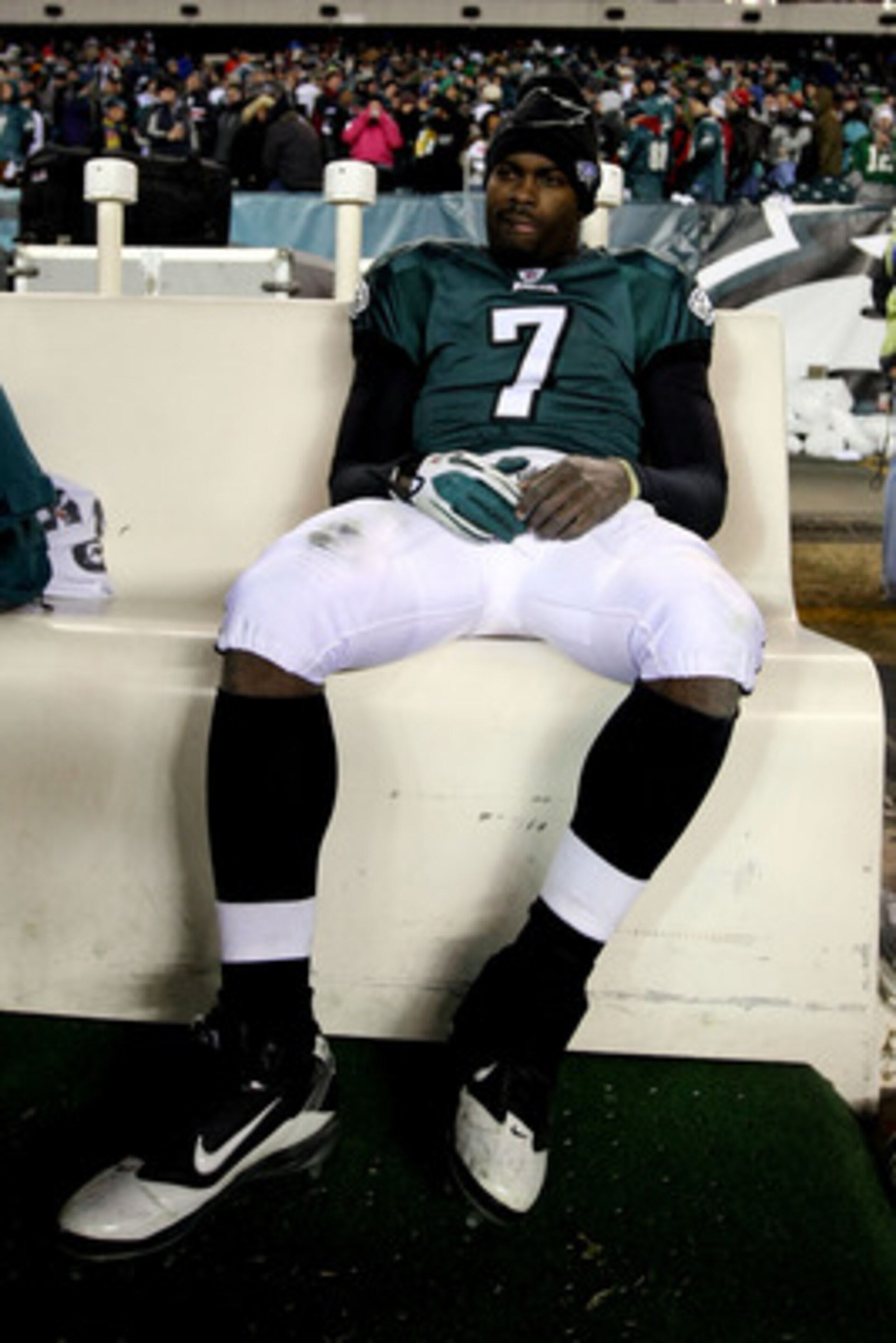 PHILADELPHIA, PA - JANUARY 09:  Michael Vick #7 of the Philadelphia Eagles sits on the bench after losing to the Green Bay Packers during the 2011 NFC wild card playoff game at Lincoln Financial Field on January 9, 2011 in Philadelphia, Pennsylvania.  (Ph