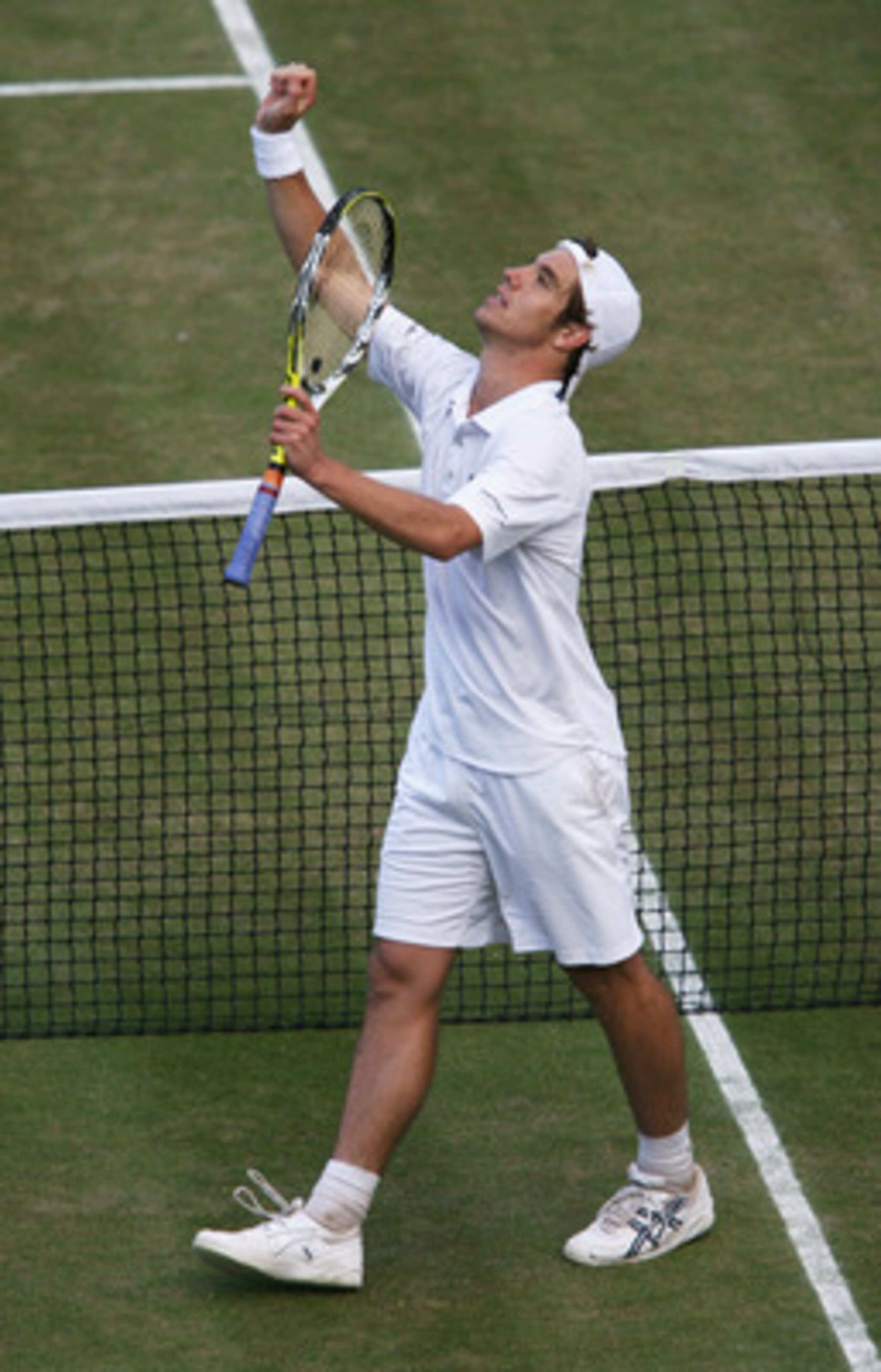 LONDON - JULY 06:  Richard Gasquet of France celebrates victory during the Men's Singles quarter-final match against Andy Roddick of USA during day eleven of the Wimbledon Lawn Tennis Championships at the All England Lawn Tennis and Croquet Club on July 6