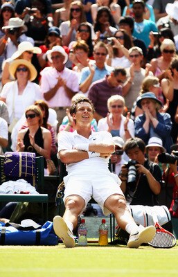 LONDON, ENGLAND - JUNE 30:  Tomas Berdych of Czech Republic celebrates winning his Quarter Final match against Roger Federer of Switzerland on Day Nine of the Wimbledon Lawn Tennis Championships at the All England Lawn Tennis and Croquet Club on June 30, 