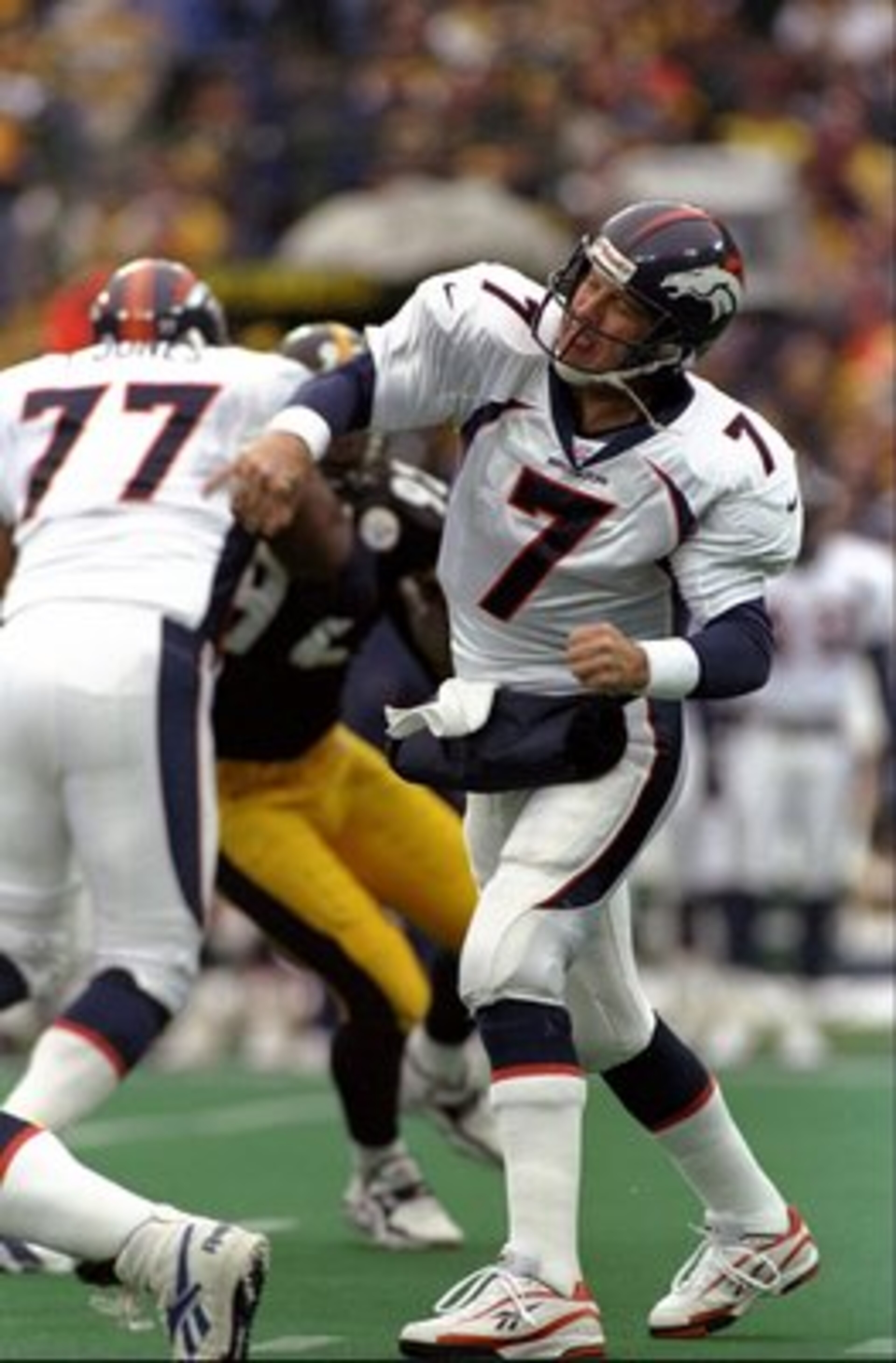 7 Dec 1997:  Quarterback John Elway #7 of the Denver Broncos throws a pass during a game against the Pittsburgh Steelers at the Three Rivers Stadium in Pittsburgh, Pennsylvania. The Steelers defeated the Broncos 35-24. Mandatory Credit: Craig Jones  /Alls