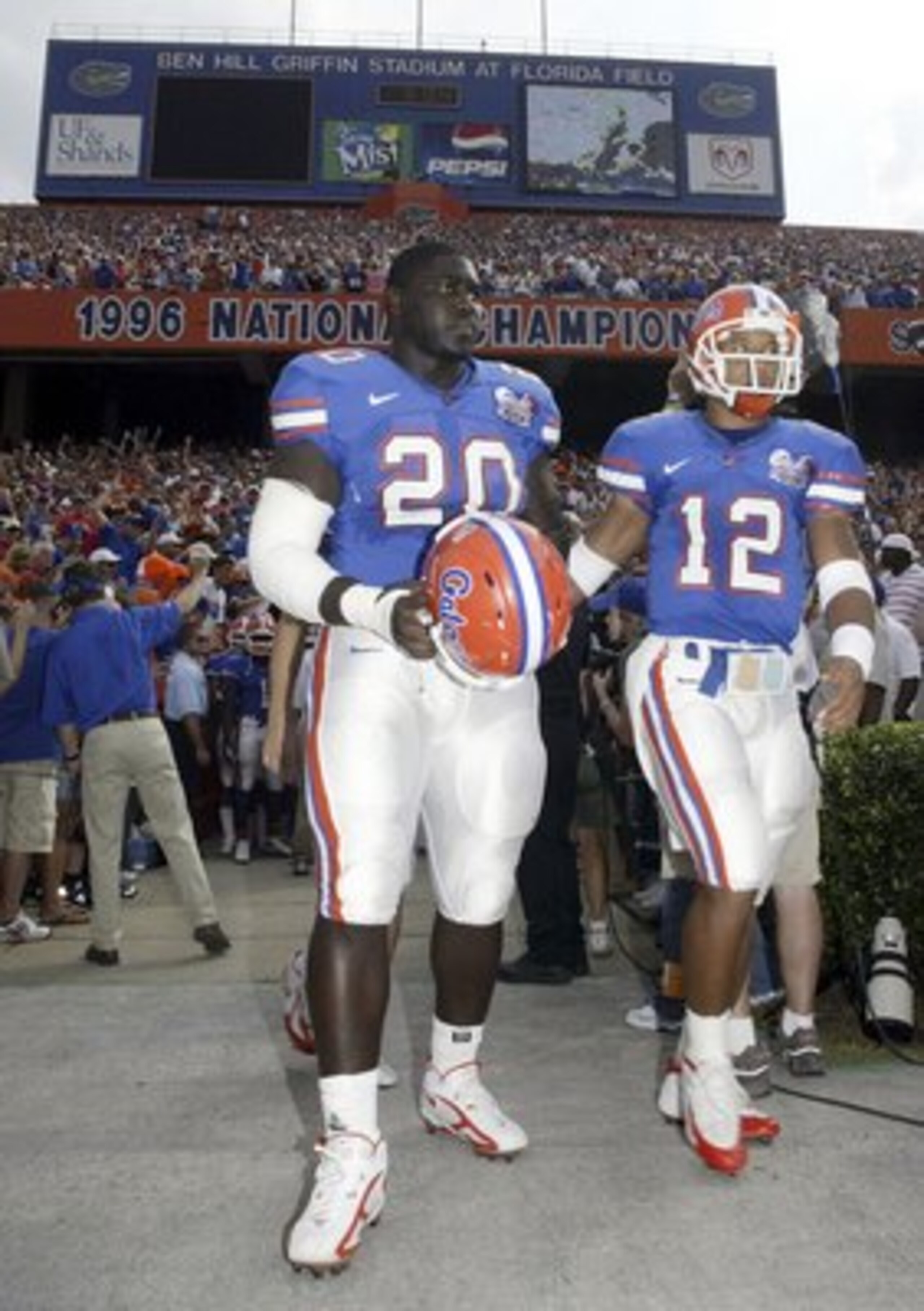 GAINESVILLE, FL - OCTOBER 07:  Florida Gators quarterback Chris Leak #12 and defensive back Joe Cohen #20 take the field against the Louisiana State Tigers at Ben Hill Griffin Stadium on October 7, 2006 in Gainesville, Florida.  (Photo by Marc Serota/Gett