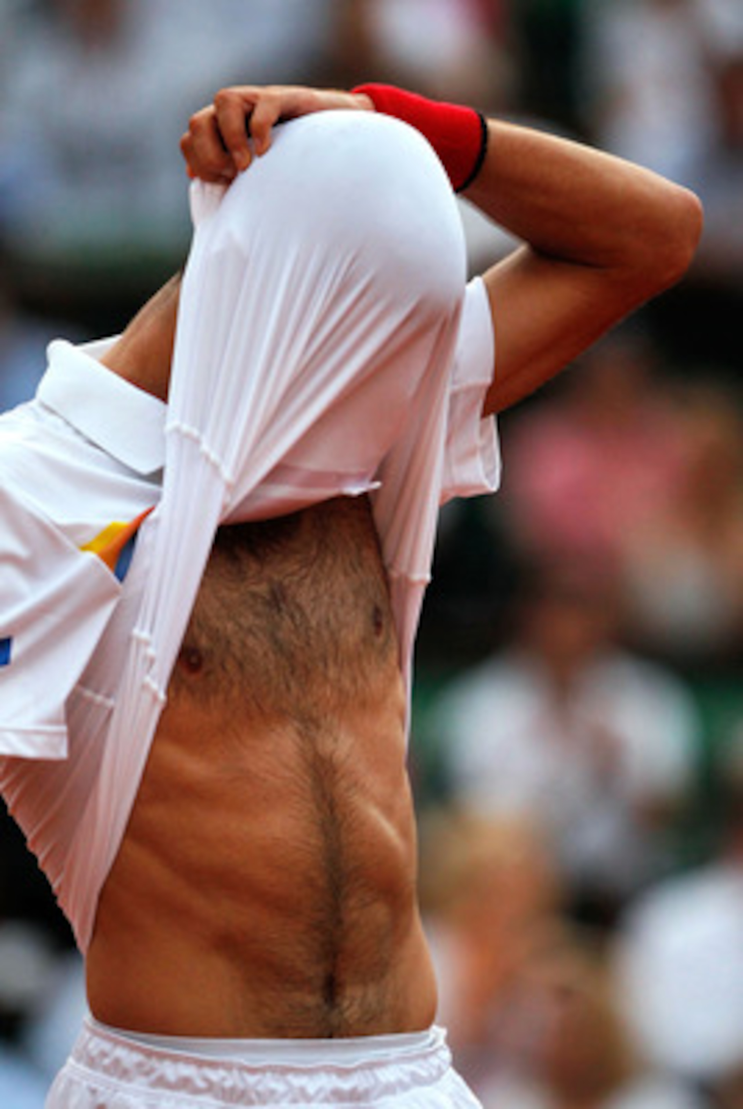 PARIS, FRANCE - JUNE 03:  A dejected Novak Djokovic of Serbia reacts during the men's singles semi final match between Roger Federer of Switzerland and Novak Djokovic of Serbia on day thirteen of the French Open at Roland Garros on June 3, 2011 in Paris, 