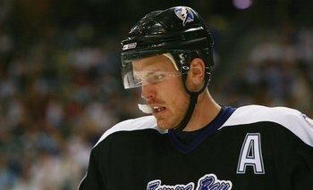 TAMPA - APRIL 22:  A dejected Brad Richards #19 of the Tampa Bay Lightning looks on against the New Jersey Devils in Game 6 of the Eastern Conference Quarter-finals during the 2007 NHL Stanley Cup Playoffs on April 22, 2007 at the St. Pete Times Forum in