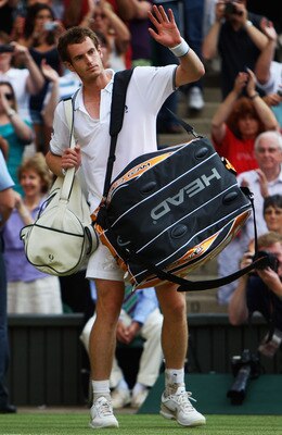 WIMBLEDON, ENGLAND - JULY 03:  Andy Murray of Great Britain waves to the crowd after defeat during the men's singles semi final match against Andy Roddick of USA on Day Eleven of the Wimbledon Lawn Tennis Championships at the All England Lawn Tennis and C