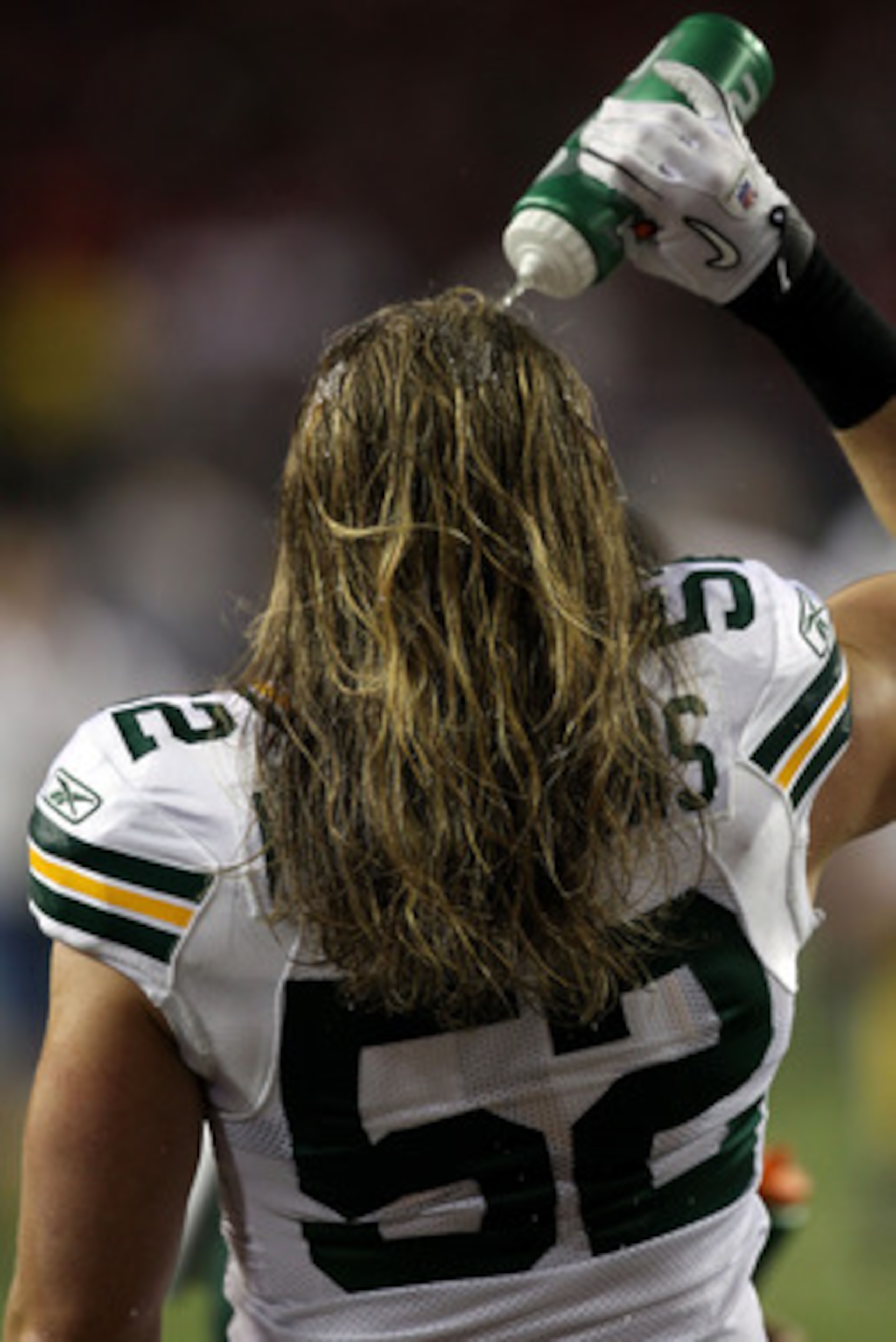 ATLANTA, GA - JANUARY 15: Clay Matthews #52 of the Green Bay Packers squirts water on his face durign wamr ups against the Atlanta Falcons during their 2011 NFC divisional playoff game at Georgia Dome on January 15, 2011 in Atlanta, Georgia. (Photo by S ATLANTA, GA - JANUARY 15: Clay Matthews #52 of the Green Bay Packers squirts water on his face durign wamr ups against the Atlanta Falcons during their 2011 NFC divisional playoff game at Georgia Dome on January 15, 2011 in Atlanta, Georgia. (Photo by S
