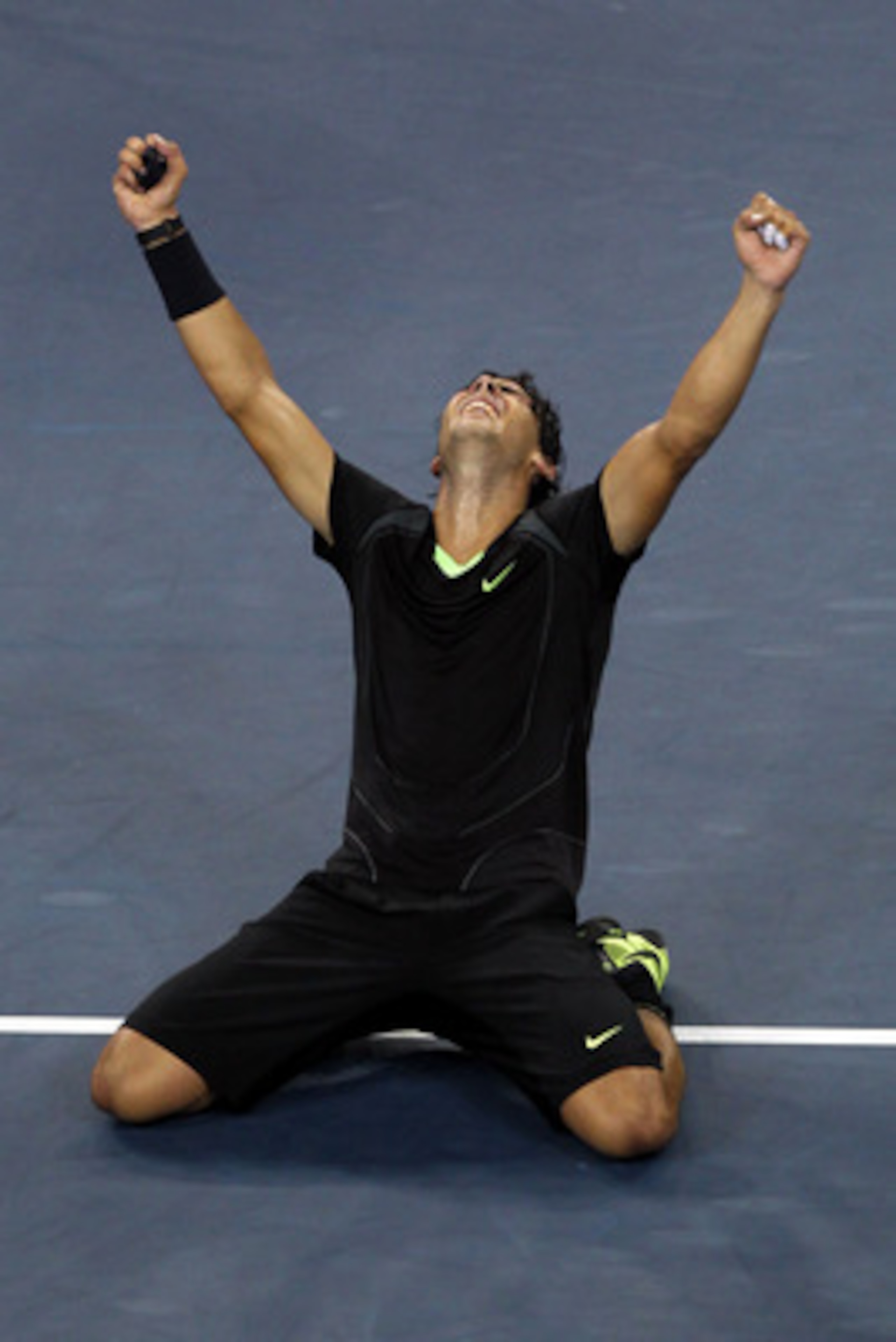 NEW YORK - SEPTEMBER 13: Rafael Nadal of Spain falls to his knees in celebration of his win over Novak Djokovic of Serbia during their men's singles final on day fifteen of the 2010 U.S. Open at the USTA Billie Jean King National Tennis Center on Septemb NEW YORK - SEPTEMBER 13: Rafael Nadal of Spain falls to his knees in celebration of his win over Novak Djokovic of Serbia during their men's singles final on day fifteen of the 2010 U.S. Open at the USTA Billie Jean King National Tennis Center on Septemb