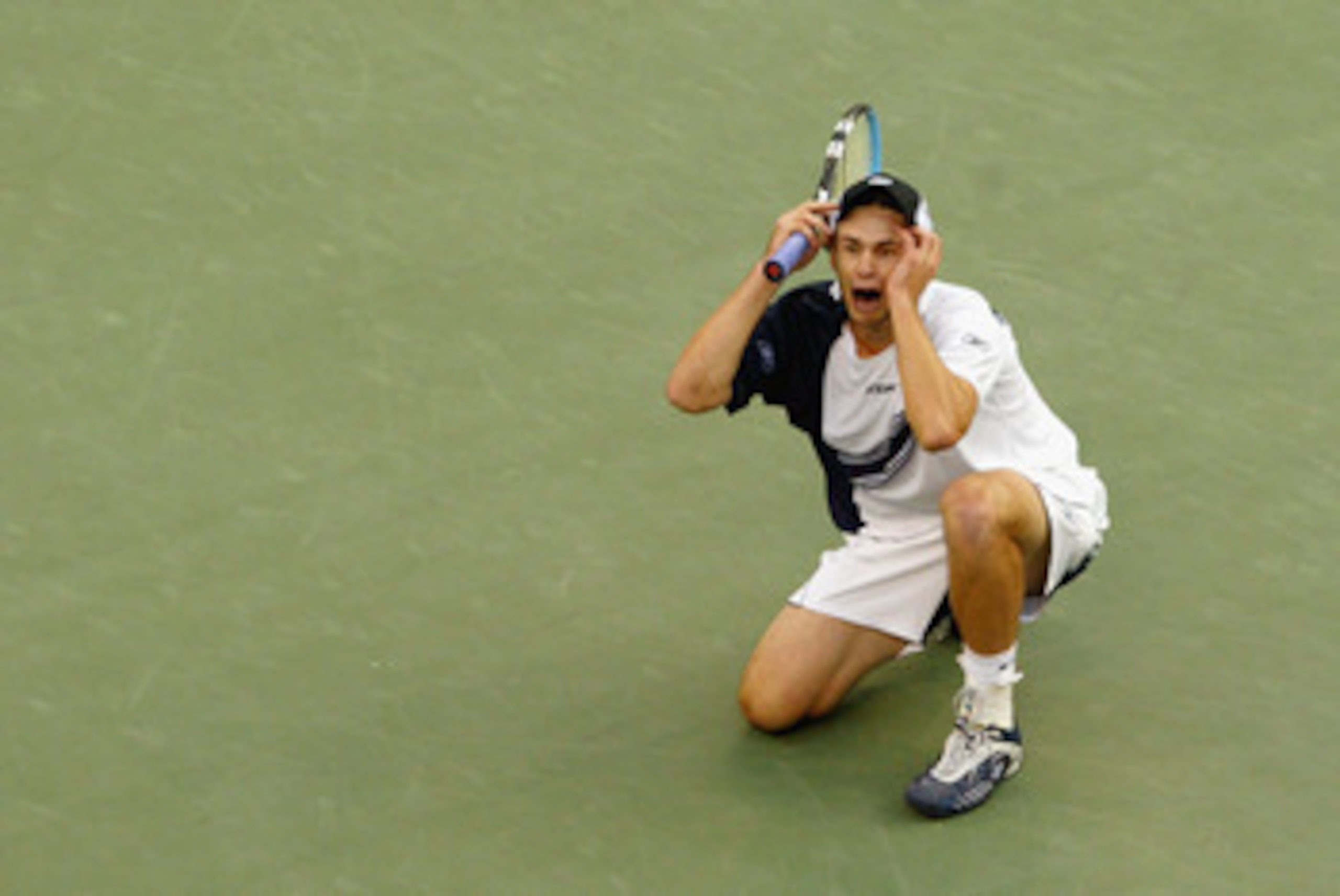 FLUSHING, NY - SEPTEMBER 7: Andy Roddick celebrates match point against Juan Carlos Ferrero of Spain during the US Open men's singles final at Arthur Ashe Stadium in the USTA National Tennis Center on September 7, 2003 in Flushing, New York. Roddick def FLUSHING, NY - SEPTEMBER 7: Andy Roddick celebrates match point against Juan Carlos Ferrero of Spain during the US Open men's singles final at Arthur Ashe Stadium in the USTA National Tennis Center on September 7, 2003 in Flushing, New York. Roddick def