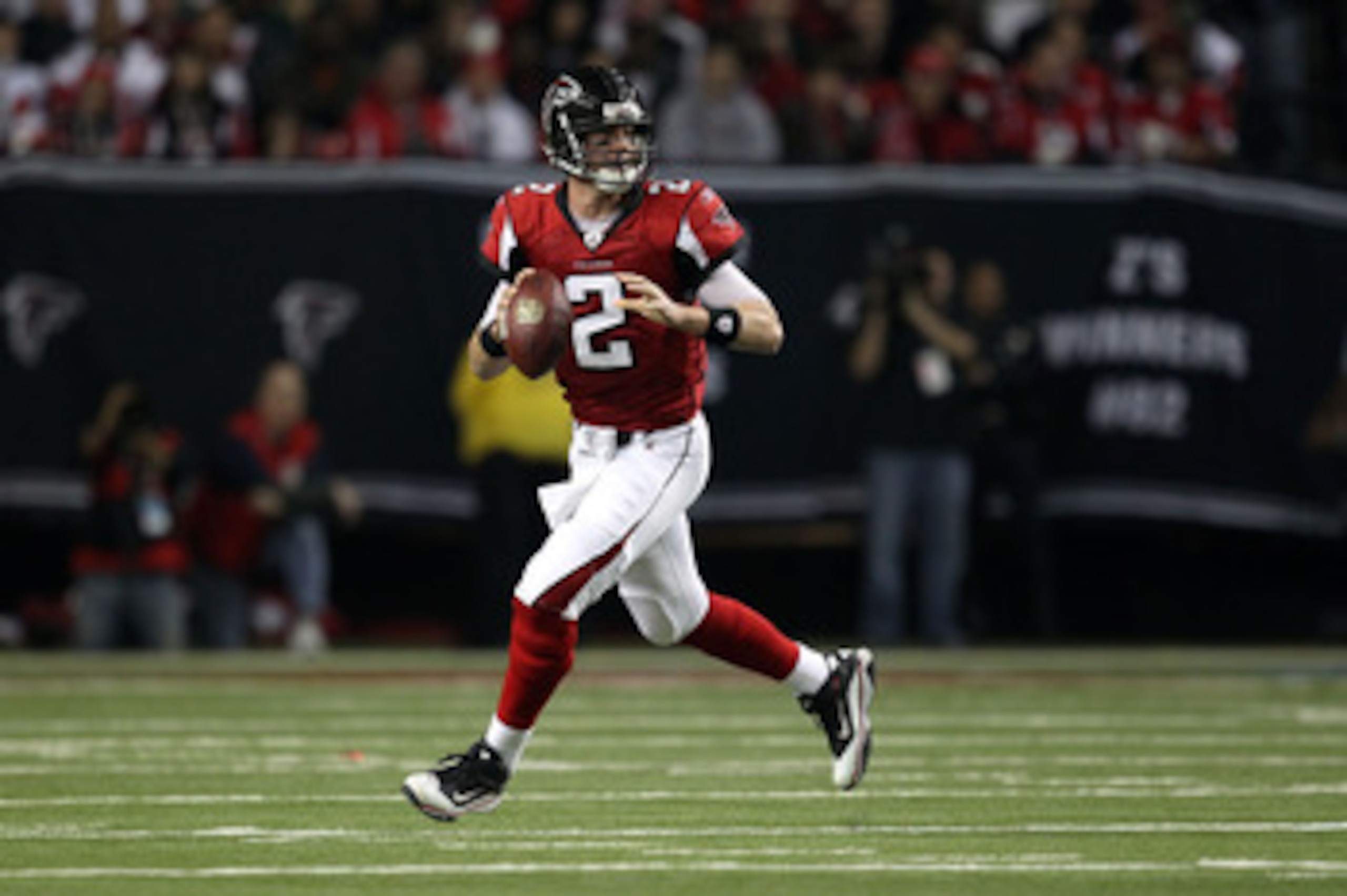 ATLANTA, GA - JANUARY 15: Quarterback Matt Ryan #2 of the Atlanta Falcons rolls out to pass against the Green Bay Packers during their 2011 NFC divisional playoff game at Georgia Dome on January 15, 2011 in Atlanta, Georgia. The Packers won 48-21. (Phot ATLANTA, GA - JANUARY 15: Quarterback Matt Ryan #2 of the Atlanta Falcons rolls out to pass against the Green Bay Packers during their 2011 NFC divisional playoff game at Georgia Dome on January 15, 2011 in Atlanta, Georgia. The Packers won 48-21. (Phot