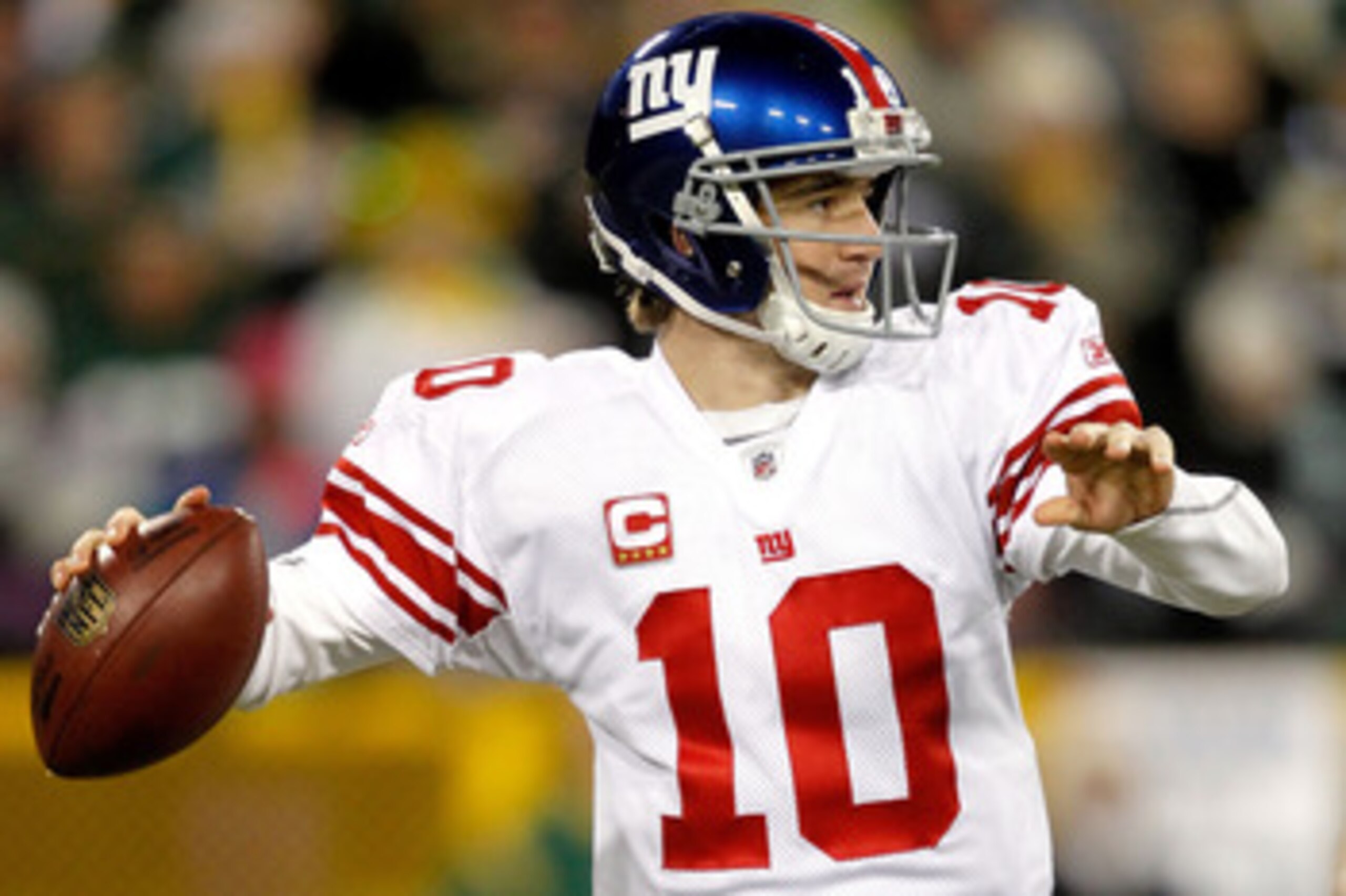 GREEN BAY, WI - DECEMBER 26: Eli Manning #10 of the New York Giants throws against the Green Bay Packers at Lambeau Field on December 26, 2010 in Green Bay, Wisconsin. (Photo by Matthew Stockman/Getty Images) GREEN BAY, WI - DECEMBER 26: Eli Manning #10 of the New York Giants throws against the Green Bay Packers at Lambeau Field on December 26, 2010 in Green Bay, Wisconsin. (Photo by Matthew Stockman/Getty Images)