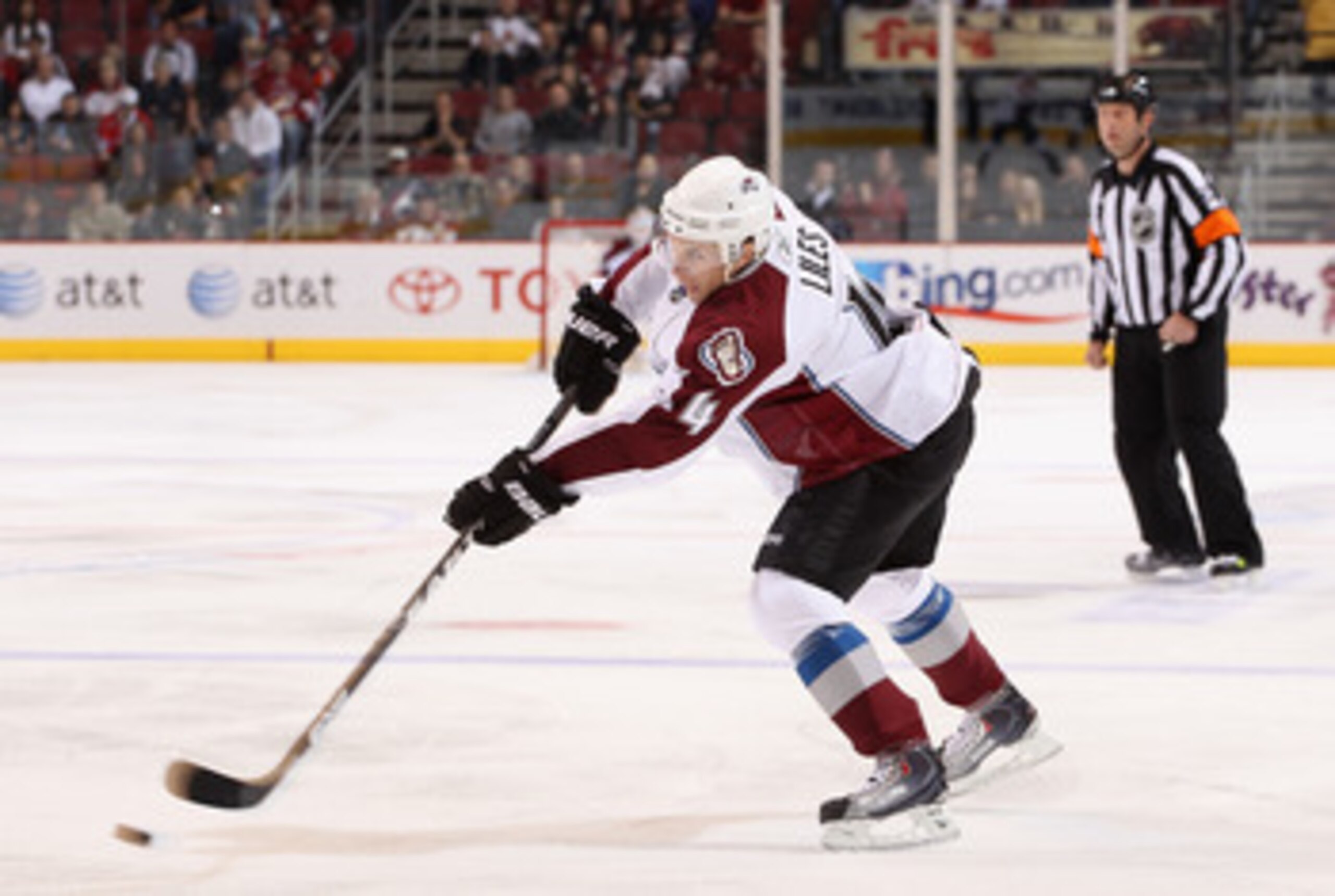GLENDALE, AZ - APRIL 01: John-Michael Liles #4 of the Colorado Avalanche passes the puck during the NHL game against the Phoenix Coyotes at Jobing.com Arena on April 1, 2011 in Glendale, Arizona. The Avalanche defeated the Coyotes 4-3 in an overtime sho GLENDALE, AZ - APRIL 01: John-Michael Liles #4 of the Colorado Avalanche passes the puck during the NHL game against the Phoenix Coyotes at Jobing.com Arena on April 1, 2011 in Glendale, Arizona. The Avalanche defeated the Coyotes 4-3 in an overtime sho