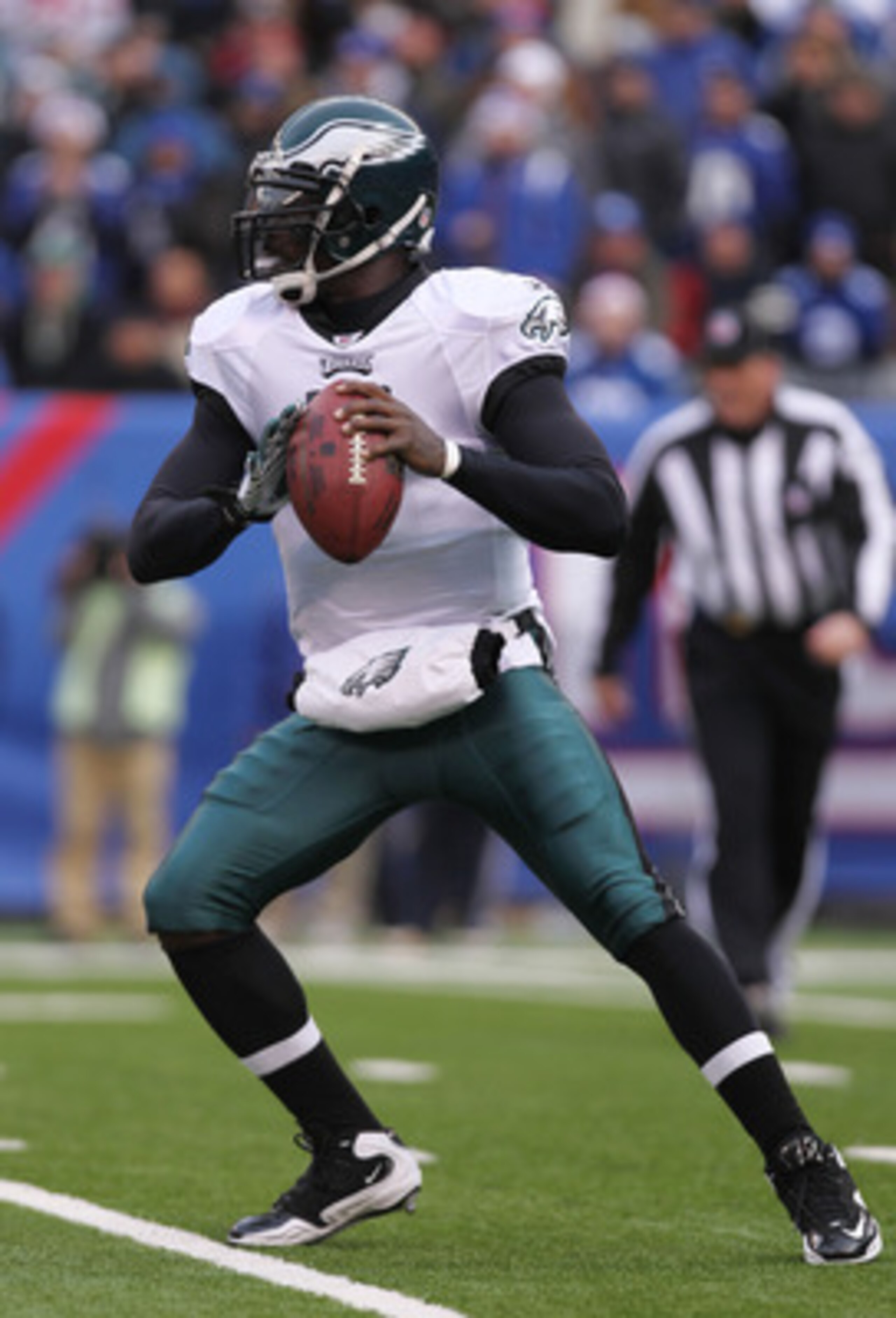 EAST RUTHERFORD, NJ - DECEMBER 19: Michael Vick #7 of the Philadelphia Eagles against the New York Giants at New Meadowlands Stadium on December 19, 2010 in East Rutherford, New Jersey. (Photo by Nick Laham/Getty Images) EAST RUTHERFORD, NJ - DECEMBER 19: Michael Vick #7 of the Philadelphia Eagles against the New York Giants at New Meadowlands Stadium on December 19, 2010 in East Rutherford, New Jersey. (Photo by Nick Laham/Getty Images)
