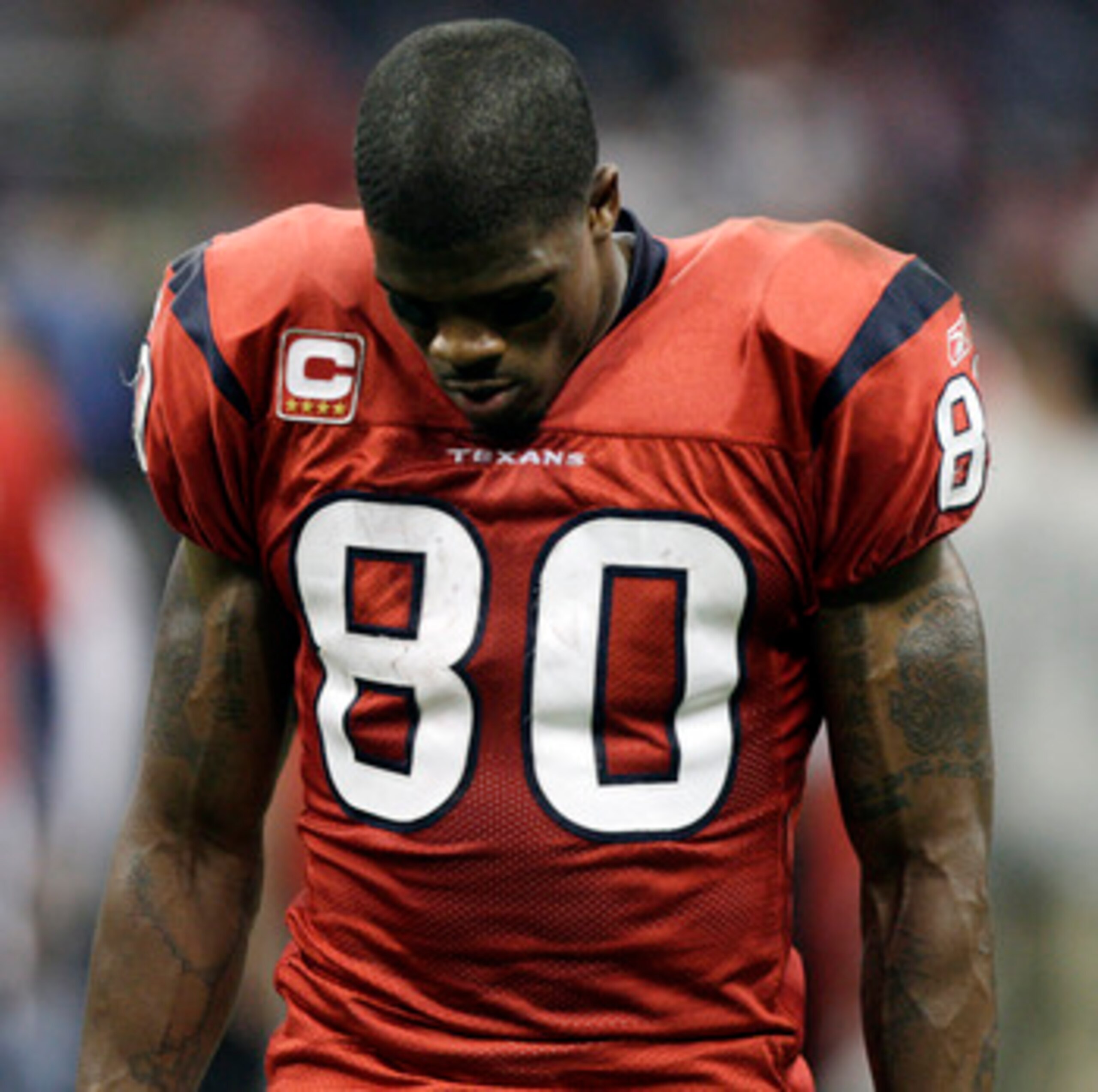 HOUSTON, TX - DECEMBER 13: A dejected Andre Johnson #80 of the Houston Texans walks off the field after Houston was defeated by Baltimore in overtime at Reliant Stadium on December 13, 2010 in Houston, Texas. (Photo by Bob Levey/Getty Images) HOUSTON, TX - DECEMBER 13: A dejected Andre Johnson #80 of the Houston Texans walks off the field after Houston was defeated by Baltimore in overtime at Reliant Stadium on December 13, 2010 in Houston, Texas. (Photo by Bob Levey/Getty Images)