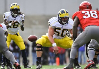 COLUMBUS, OH - NOVEMBER 27: David Molk #50 of the Michigan Wolverines blocks against the Ohio State Buckeyes at Ohio Stadium on November 27, 2010 in Columbus, Ohio. (Photo by Jamie Sabau/Getty Images) COLUMBUS, OH - NOVEMBER 27: David Molk #50 of the Michigan Wolverines blocks against the Ohio State Buckeyes at Ohio Stadium on November 27, 2010 in Columbus, Ohio. (Photo by Jamie Sabau/Getty Images)
