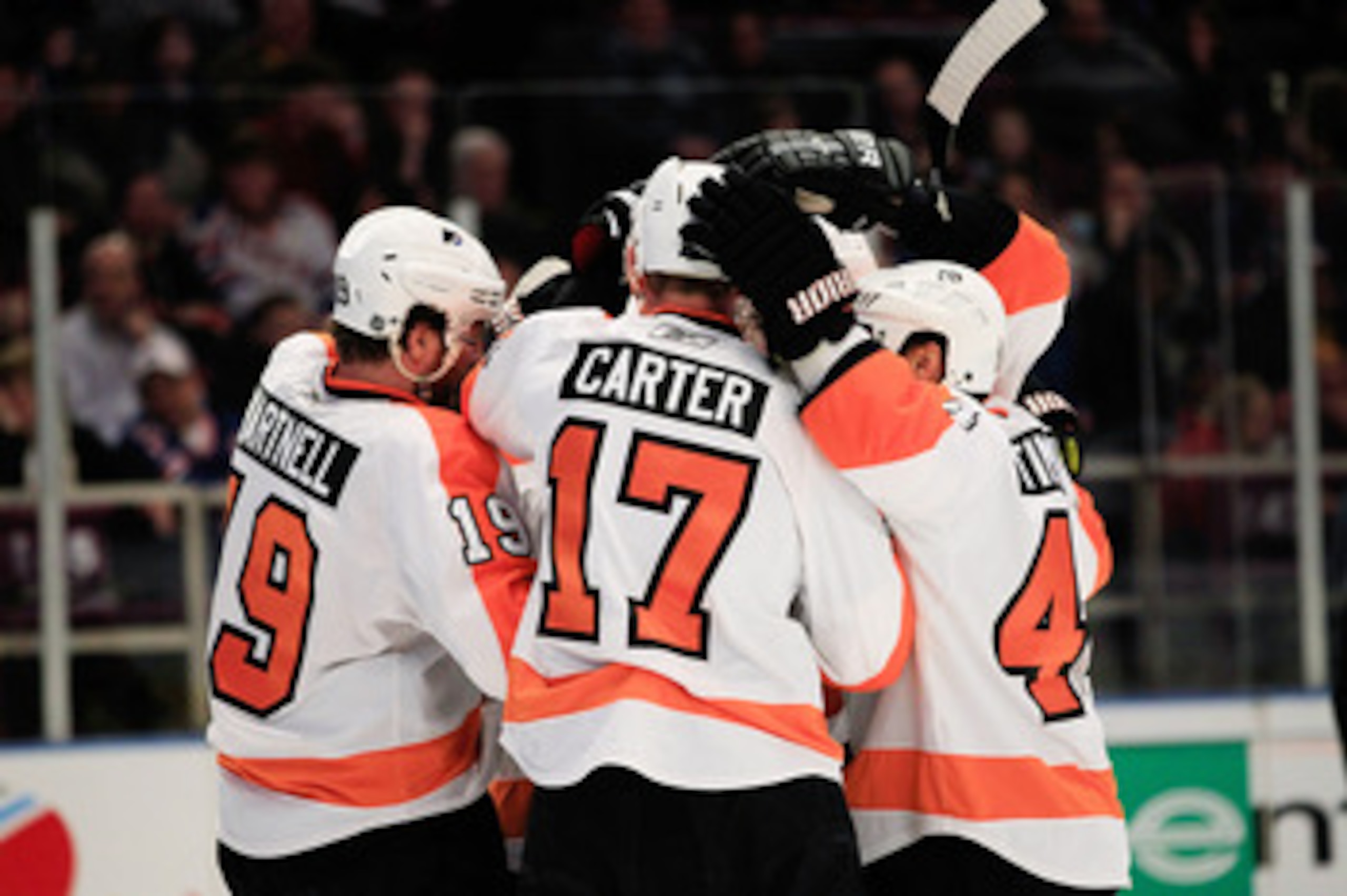 NEW YORK, NY - FEBRUARY 20: Jeff Carter #17 of the Philadelpia Flyers is congratulated by his teammates for his first period goal against the New York Rangers at Madison Square Garden on February 20, 2011 in New York City. (Photo by Chris Trotman/Getty NEW YORK, NY - FEBRUARY 20: Jeff Carter #17 of the Philadelpia Flyers is congratulated by his teammates for his first period goal against the New York Rangers at Madison Square Garden on February 20, 2011 in New York City. (Photo by Chris Trotman/Getty