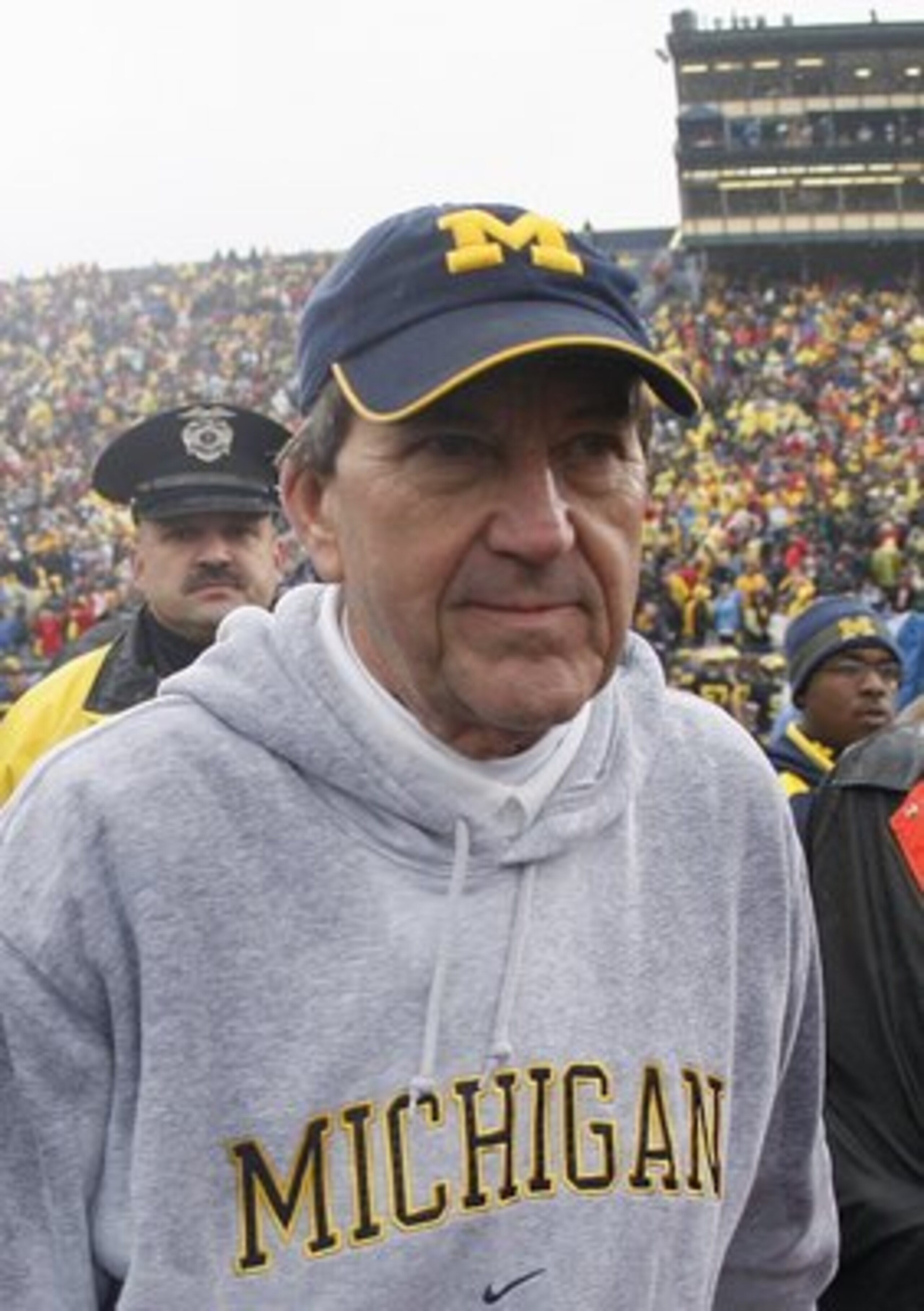 ANN ARBOR, MI - NOVEMBER 17: Head coach Lloyd Carr of the Michigan Wolverines walks of the field after a 14-3 loss to the Ohio State Buckeyes on November 17, 2007 at Michigan Stadium in Ann Arbor, Michigan. (Photo By Gregory Shamus/Getty Images)