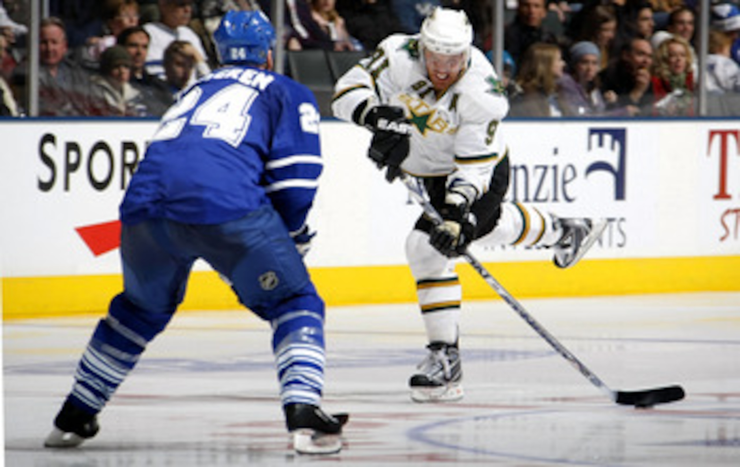 TORONTO - DECEMBER 23:   Jonas Frogren #24 of the Toronto Maple Leafs defends as Brad Richards #91 of the Dallas Stars takes a shot during their NHL game at the Air Canada Centre December 23, 2008 in Toronto, Ontario, Canada.  (Photo by Dave Sandford/Gett