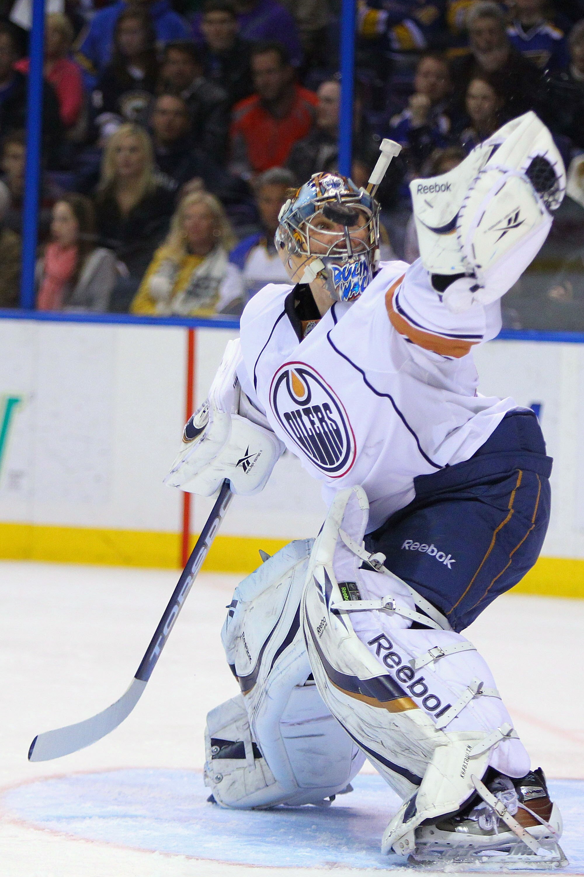 ST. LOUIS, MO - MARCH 24: Nikolai Khabibulin #35 of the Edmonton Oilers makes a save against the St. Louis Blues at the Scottrade Center on March 24, 2011 in St. Louis, Missouri.  (Photo by Dilip Vishwanat/Getty Images)