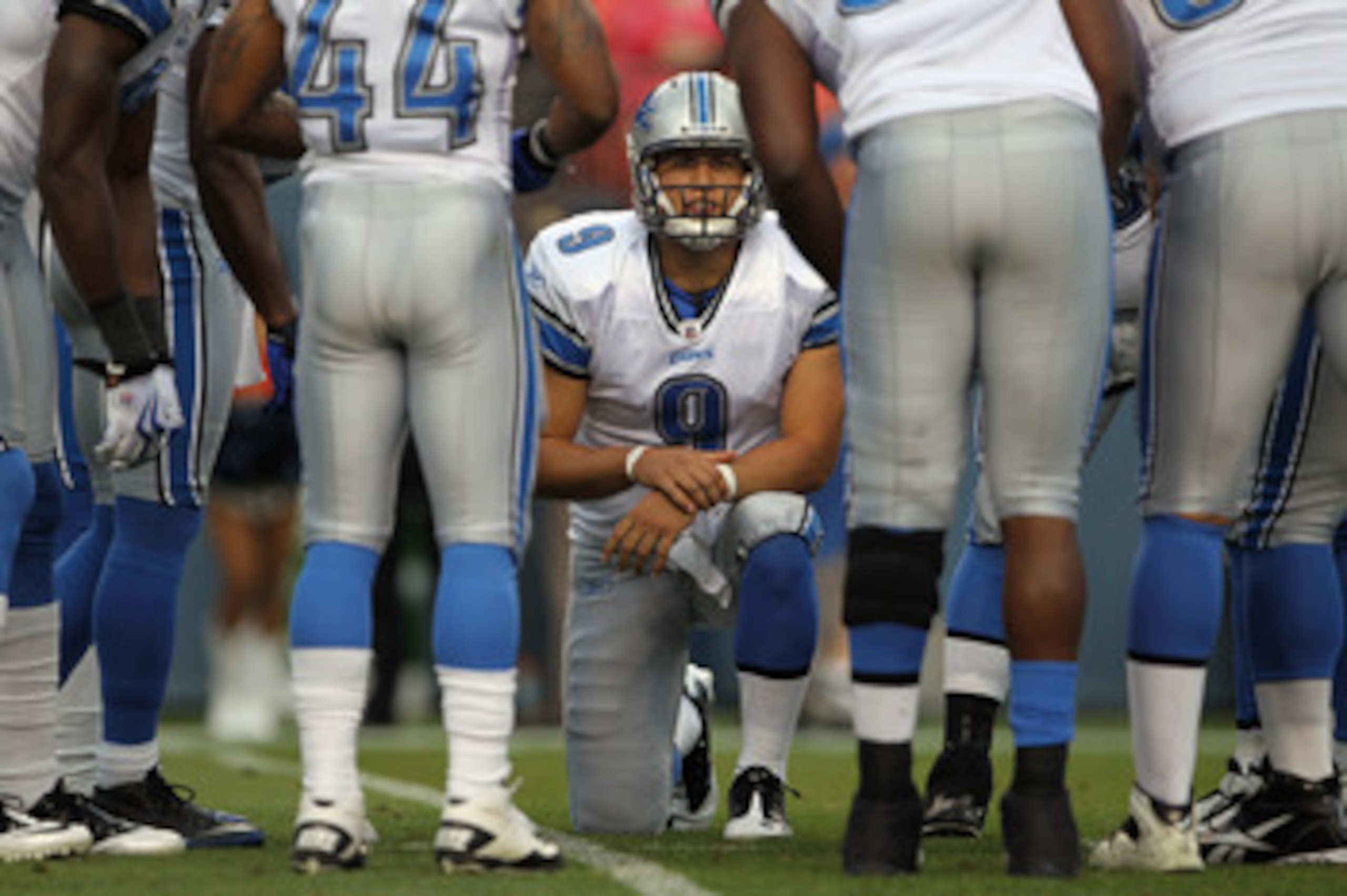 DENVER - AUGUST 21:  Quarterback Matthew Stafford #9 of the Detroit Lions runs the huddle against the Denver Broncos during preseason NFL action at INVESCO Field at Mile High on August 21, 2010 in Denver, Colorado. The Lions defeated the Broncos 25-20.  (