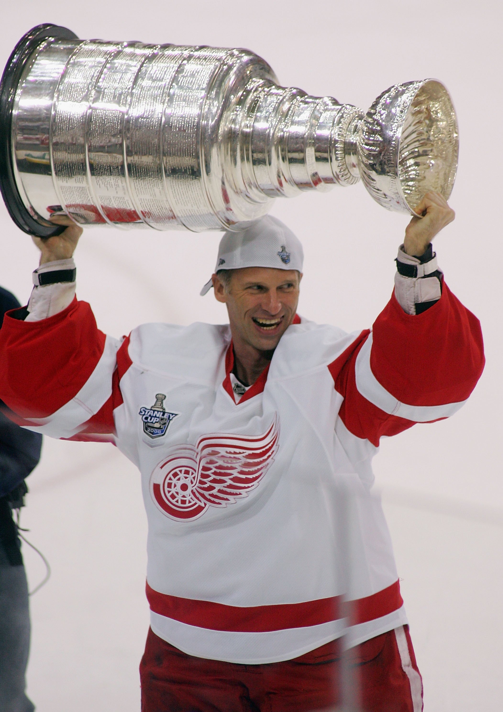 PITTSBURGH - JUNE 04:  Dominik Hasek #39 of the Detroit Red Wings celebrates with the Stanley Cup after defeating the Pittsburgh Penguins in game six of the 2008 NHL Stanley Cup Finals at Mellon Arena on June 4, 2008 in Pittsburgh. Pennsylvania. The Red W