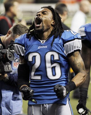 DETROIT, MI - DECEMBER 12:  Louis Delmas #26 of the Detroit Lions leaves the field celebrating a 7-3 victory over the Green Bay Packers on December 12, 2010 at Ford Field in Detroit, Michigan.  (Photo by Gregory Shamus/Getty Images)