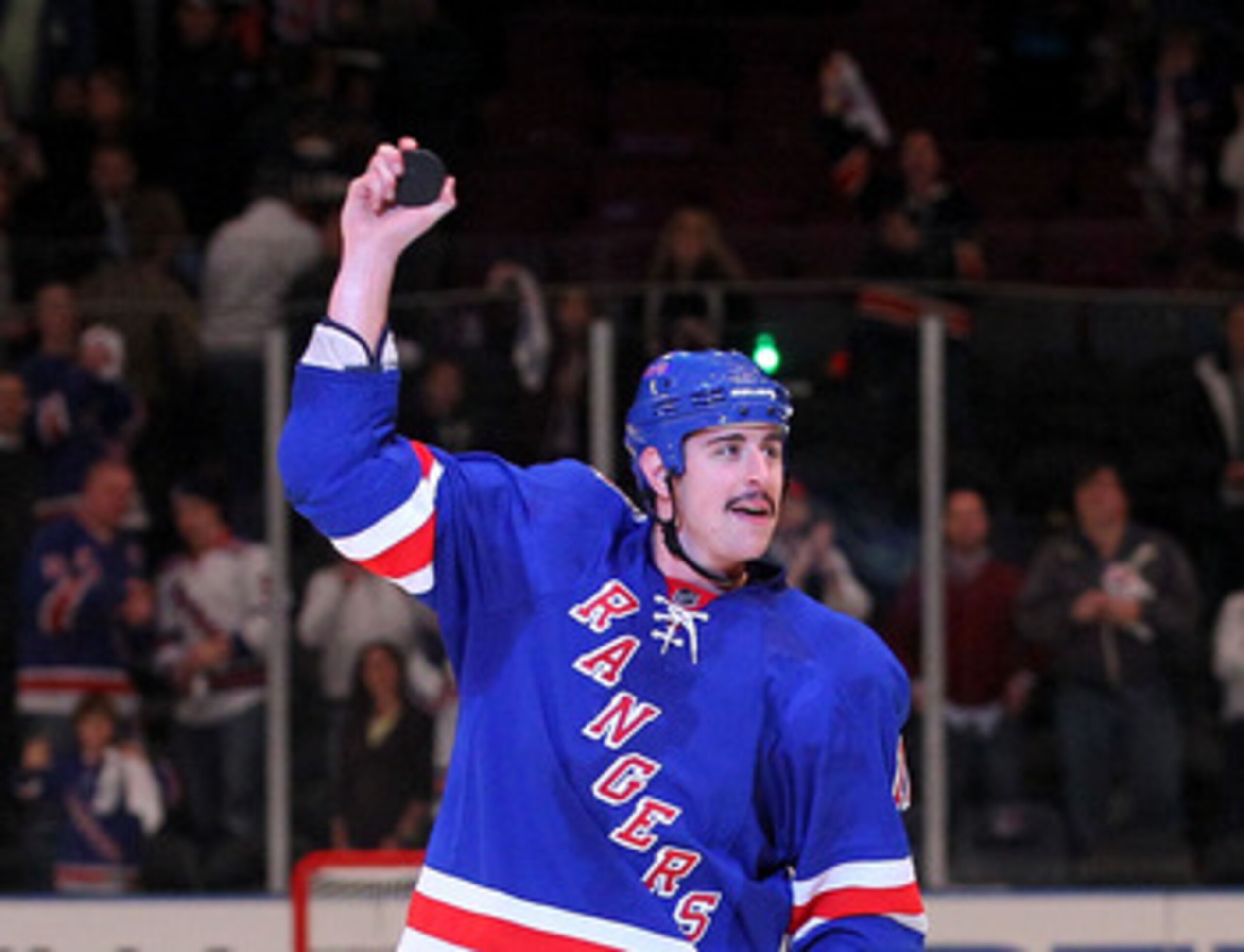 NEW YORK, NY - APRIL 17:  Brandon Dubinsky #17 of the New York Rangers skates on the ice and waves to the fans after he was named a star of the game after he scored the game winning goal to give the Rangers a 3-2 win against the Washington Capitals in Gam