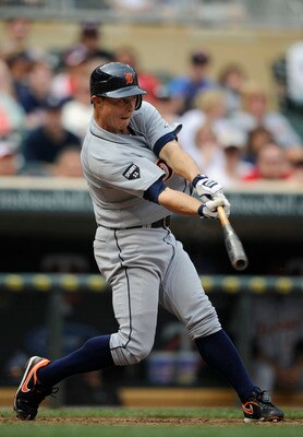 MINNEAPOLIS, MN - MAY 11: Brandon Inge #15 of the Detroit Tigers hits an RBI triple against the Minnesota Twins during in the ninth inning of their game on May 11, 2011 at Target Field in Minneapolis, Minnesota. Tigers defeated the Twins 9-7. (Photo by Ha