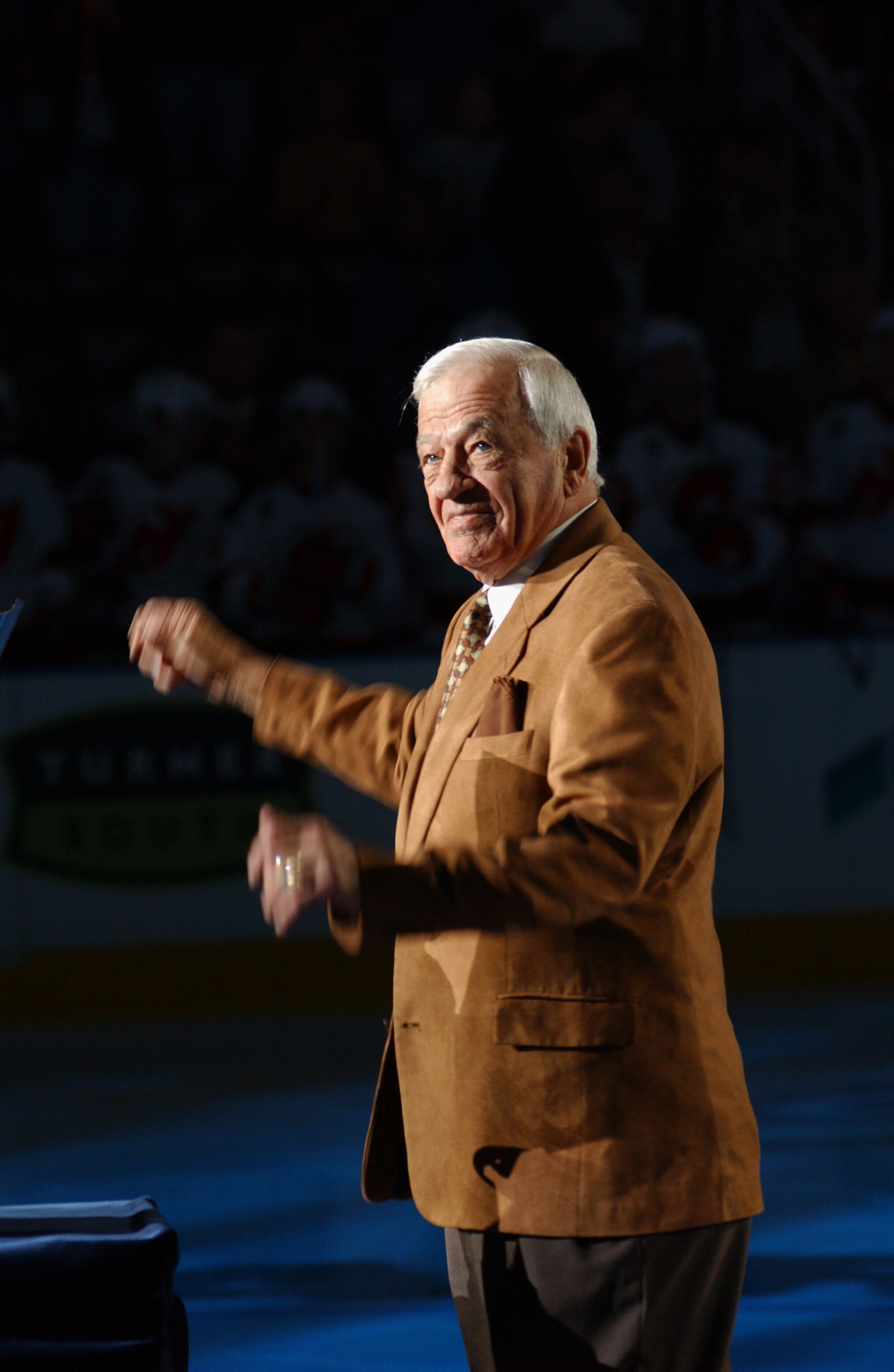 ATLANTA - OCTOBER 22:  Hockey legend Bernie 'Boom Boom' Geoffrion acknowledges the crowd after being introduced before the Atlanta Thrashers game against the New Jersey Devils on October 22, 2005 at Philips Arena in Atlanta, Georgia. The Thrashers won the