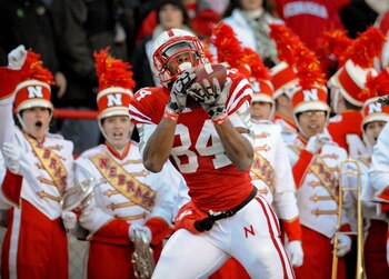 LINCOLN, NE - NOVEMBER 26: Brandon Kinnie #84 of the Nebraska Cornhuskers catches a touchdown over Jalil Brown #23 of the Colorado Buffaloes during the first half of their game at Memorial Stadium on November 26, 2010 in Lincoln, Nebraska.  Nebraska defea