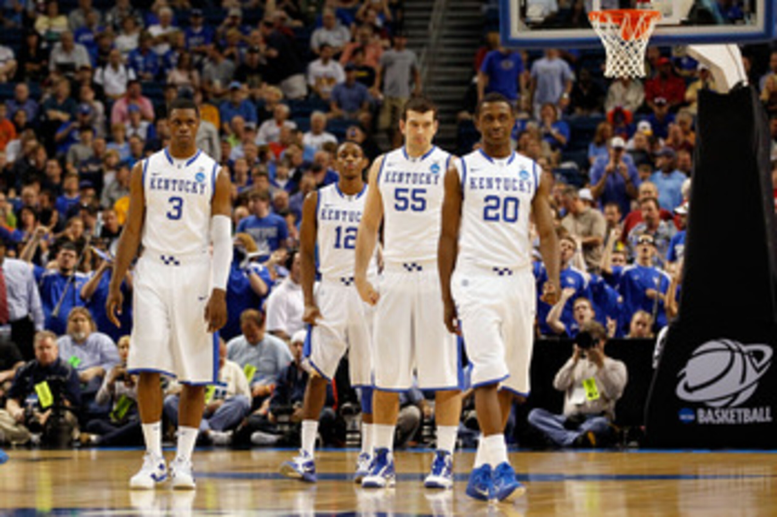 TAMPA, FL - MARCH 19:  (L-R) Terrence Jones #3, Brandon Knight #12, Josh Harrellson #55 and Doron Lamb #20 of the Kentucky Wildcats walk up court against the West Virginia Mountaineers during the third round of the 2011 NCAA men's basketball tournament at