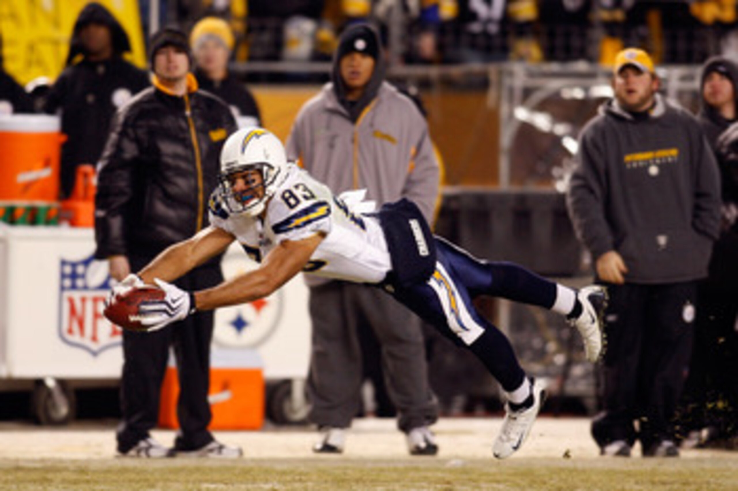 PITTSBURGH - JANUARY 11: Vincent Jackson #83 of the San Diego Chargers attempts to make a play on a pass that was originally called a reception but was over turned on a coaches challenge against the Pittsburgh Steelers during their AFC Divisional Playof PITTSBURGH - JANUARY 11: Vincent Jackson #83 of the San Diego Chargers attempts to make a play on a pass that was originally called a reception but was over turned on a coaches challenge against the Pittsburgh Steelers during their AFC Divisional Playof
