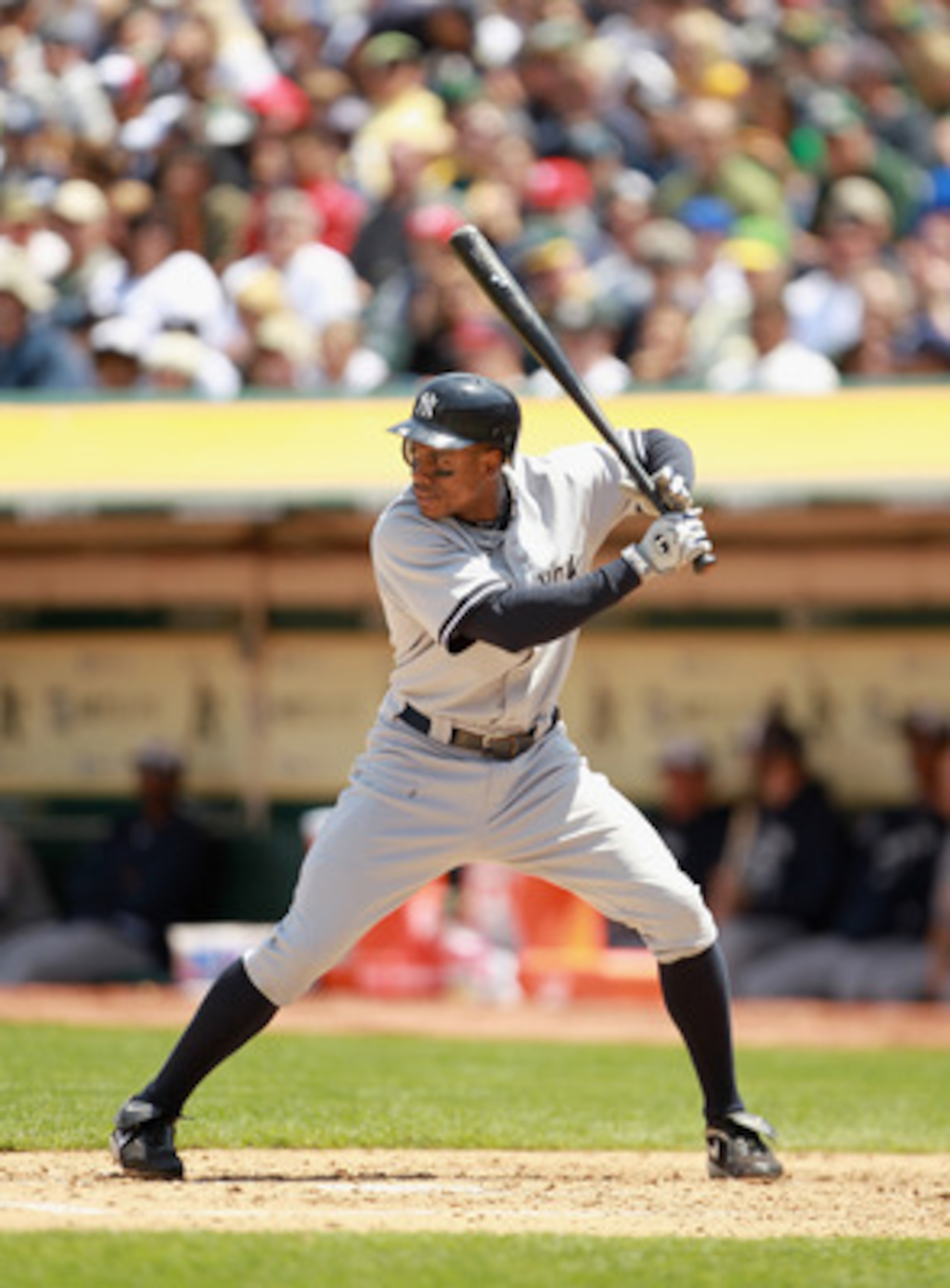 OAKLAND, CA - MAY 30:  Curtis Granderson #14 of the New York Yankees bats against the Oakland Athletics at Oakland-Alameda County Coliseum on May 30, 2011 in Oakland, California.  (Photo by Ezra Shaw/Getty Images)