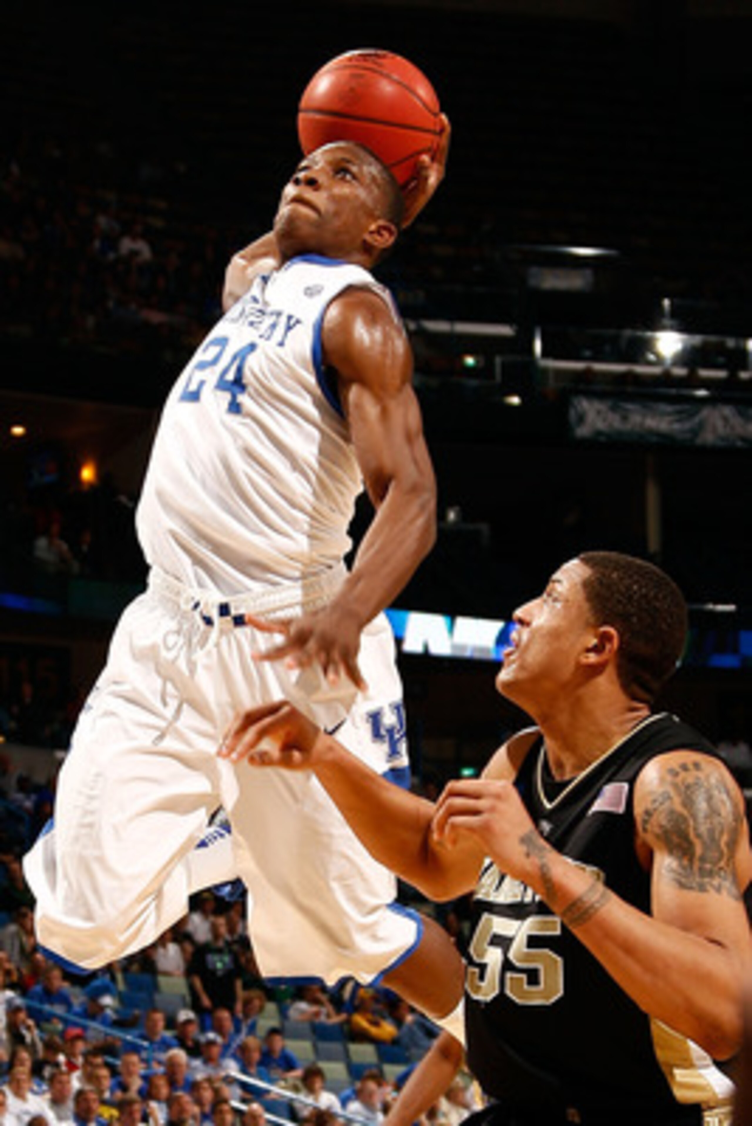 NEW ORLEANS - MARCH 20:  Eric Bledsoe #24 of the Kentucky Wildcats dunks the ball over Tony woods #55 of the Wake Forest Demon Deacons during the second round of the 2010 NCAA men's basketball tournament at the New Orleans Arena on March 20, 2010 in New O