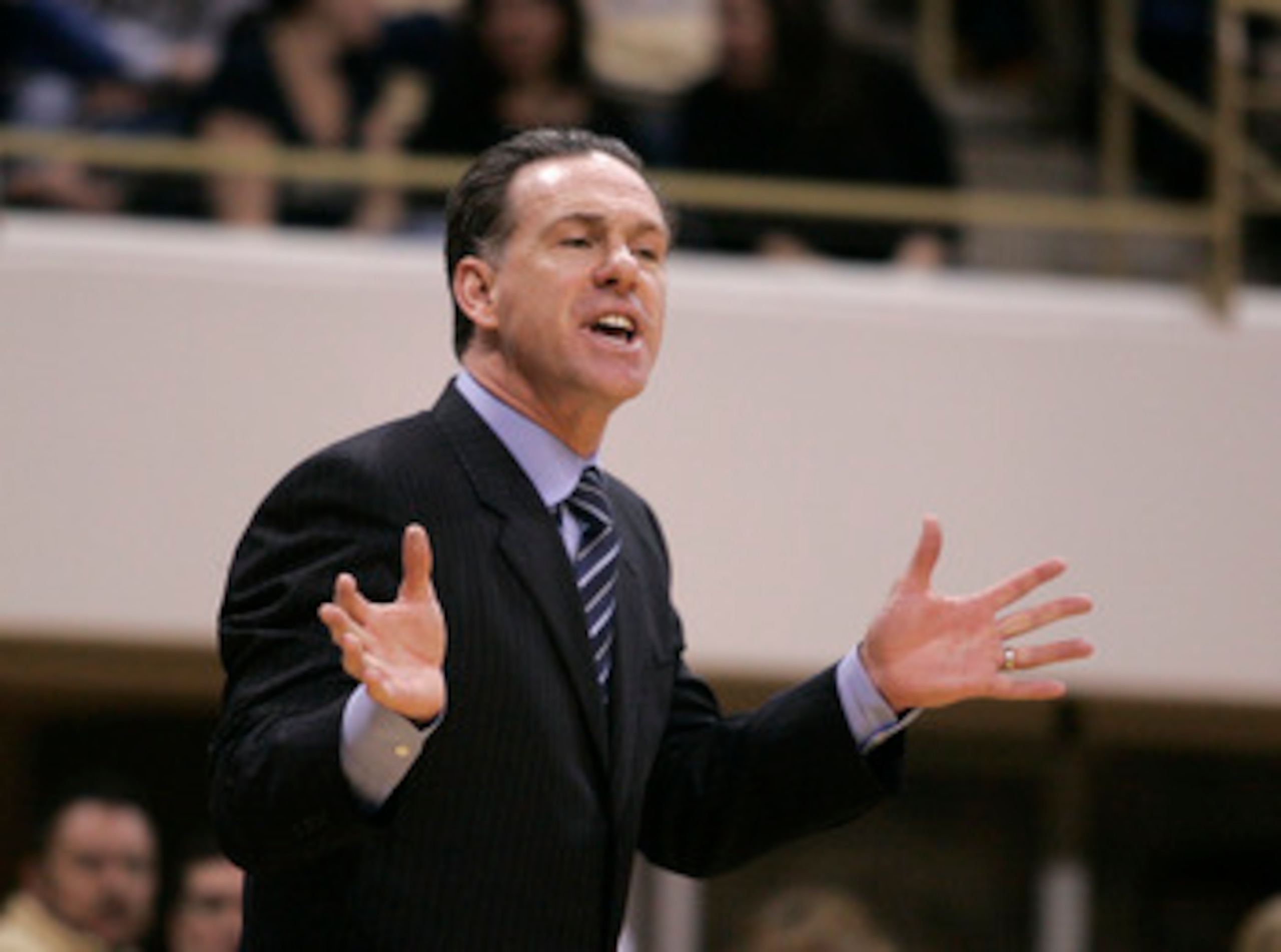 PITTSBURGH, PA - JANUARY 17:  Pittsburgh Panthers head coach Jamie Dixon talks with his players against the Syracuse Orange at Petersen Events Center on January 17, 2011 in Pittsburgh, Pennsylvania.  (Photo by Justin K. Aller/Getty Images)