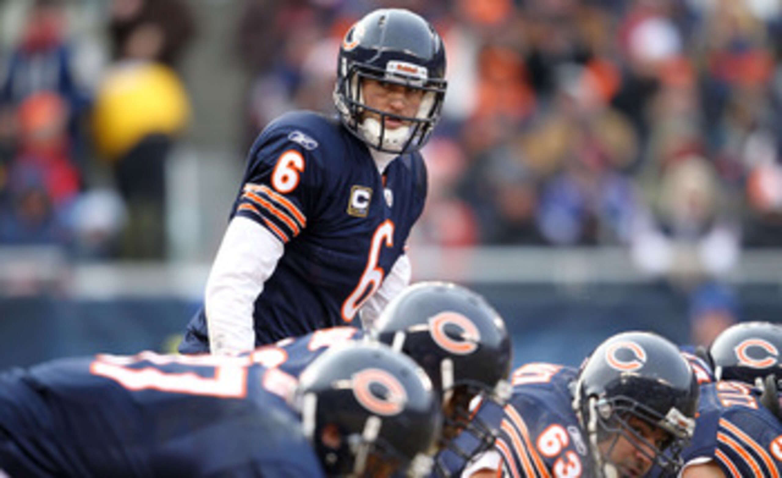 CHICAGO, IL - JANUARY 16:  Quarterback Jay Cutler #6 of the Chicago Bears under center against the Seattle Seahawks in the second quarter of the 2011 NFC divisional playoff game at Soldier Field on January 16, 2011 in Chicago, Illinois.  (Photo by Andy Ly