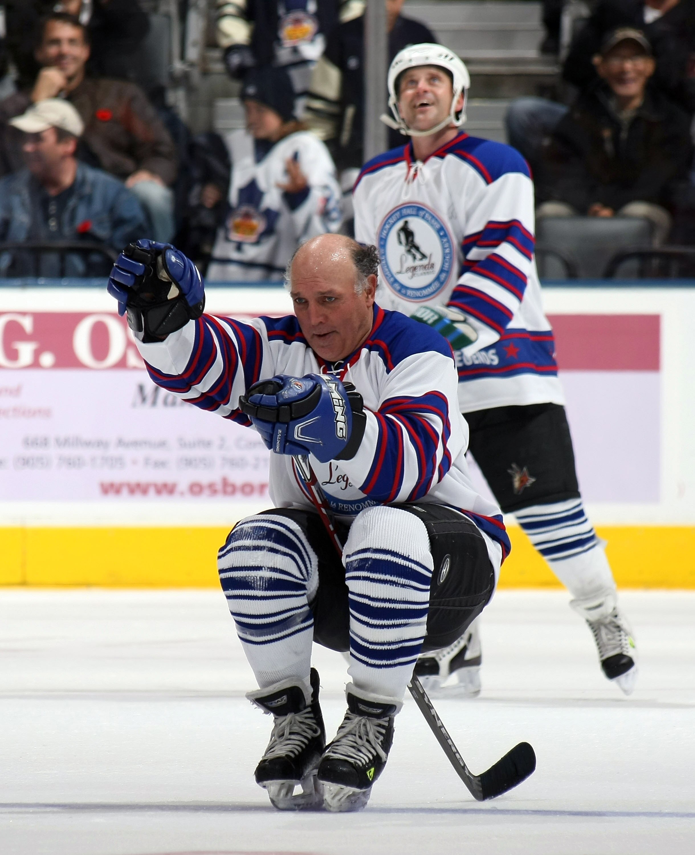 TORONTO, ON - NOVEMBER 09: Dave 'Tiger' Williams #22 of the All Star Legends rides the stick after scoring a goal against the Montreal Canadiens Legends at the Legends Classic Game on November 9, 2008 at the Air Canada Centre in Toronto, Ontario, Canada.