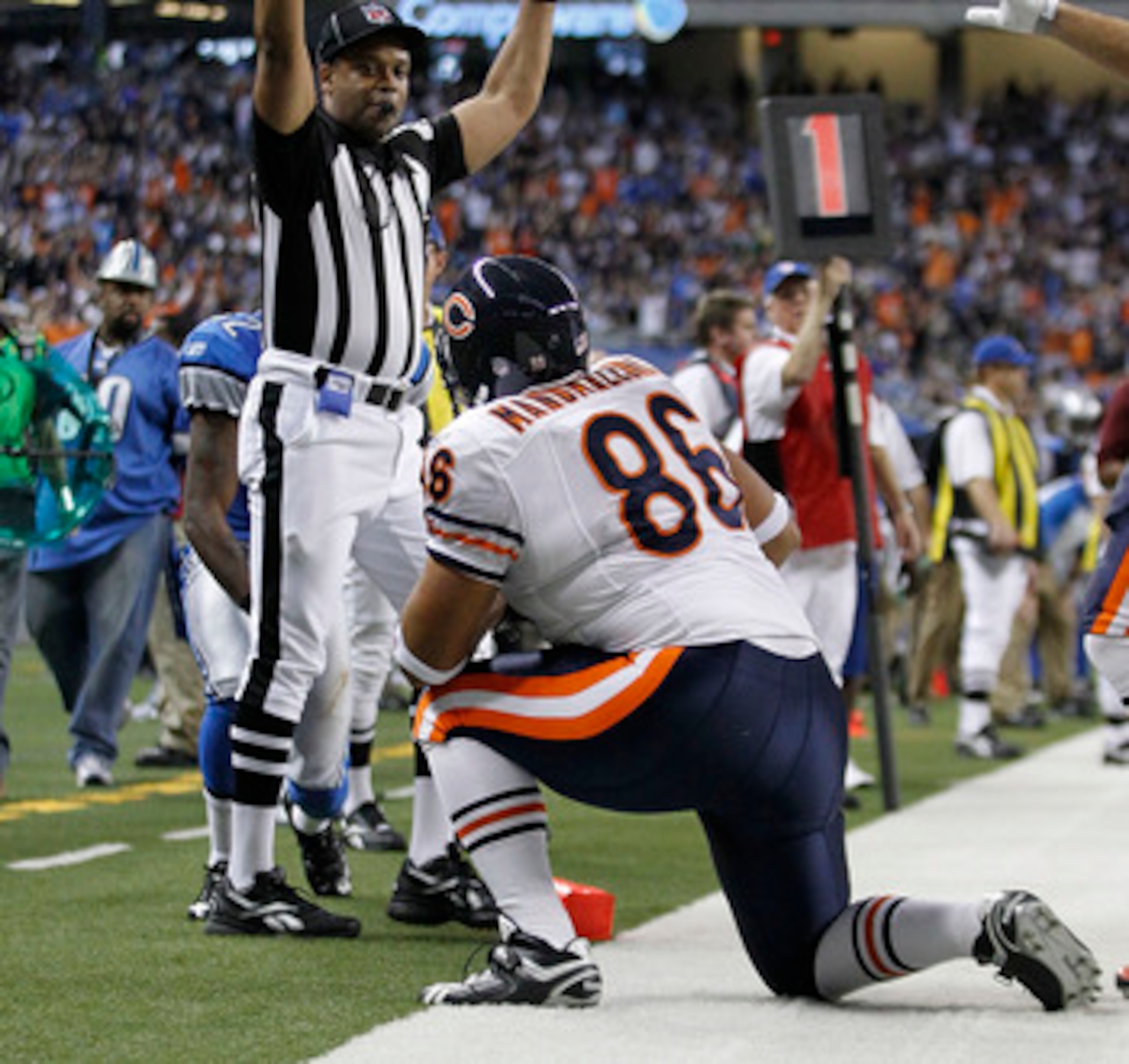 DETROIT - DECEMBER 05:  Brandon Manumaleuna #86 of the Chicago Bears celebrates a fourth quarter touchdown during the game against the Detroit Lions at Ford Field on December 5, 2010 in Detroit, Michigan. The Bears defeated the Lions 24-20.  (Photo by Leo