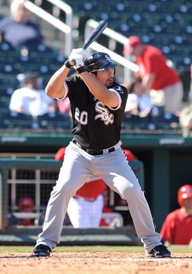 GOODYEAR, AZ - MARCH 02:  Carlos Quentin #20 of the Chicago White Sox gets ready in the batters box against the Cincinnati Reds during a spring training game at Goodyear Ballpark on March 2, 2011 in Goodyear, Arizona.  (Photo by Norm Hall/Getty Images)