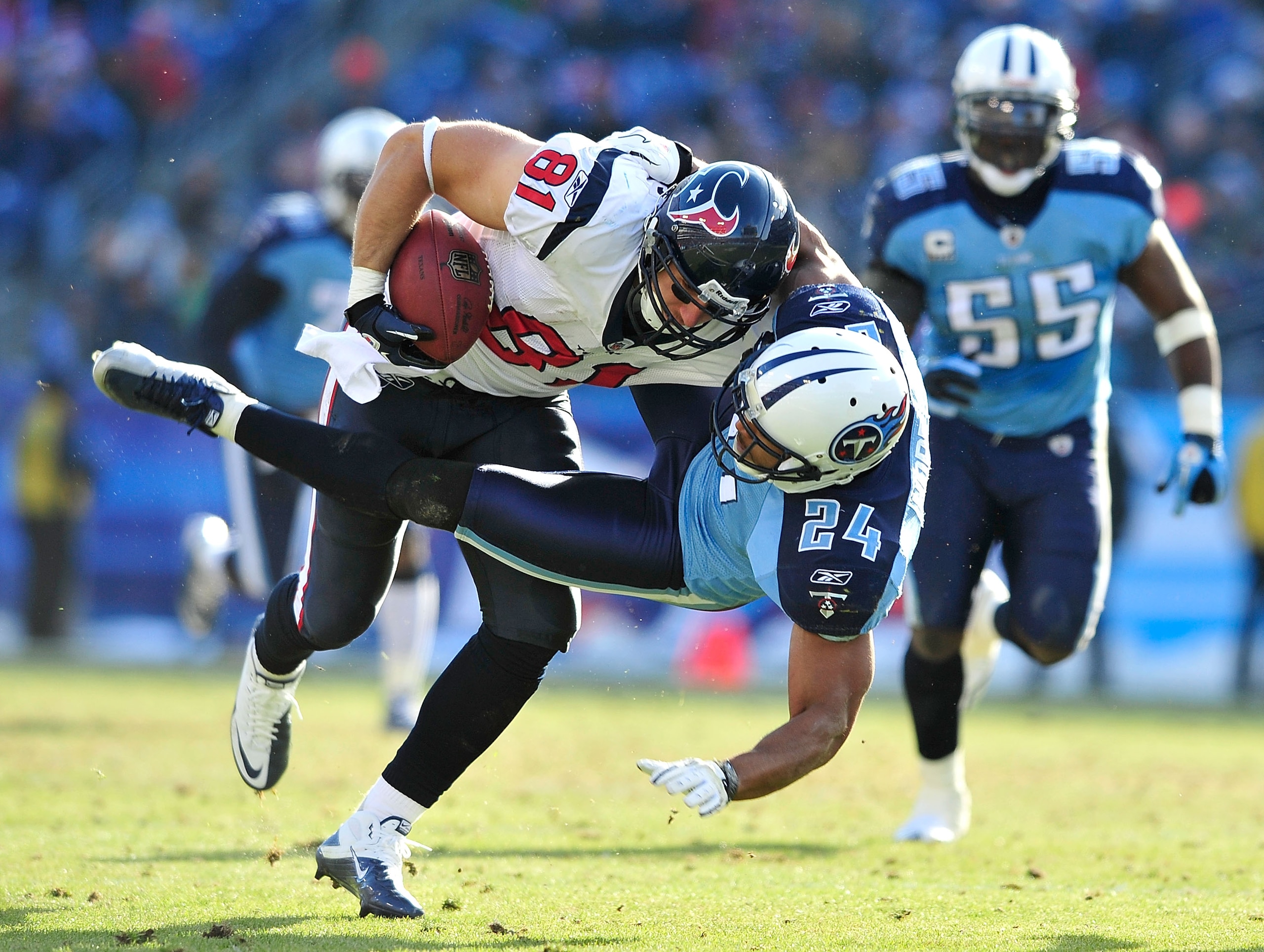 NASHVILLE, TN - DECEMBER 19:  Chris Hope #24 of the Tennessee Titans tackles Owen Daniels #81 of the Houston Texans at LP Field on December 19, 2010 in Nashville, Tennessee. The Titans defeated the Texans, 31-17.  (Photo by Grant Halverson/Getty Images)