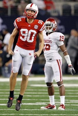 ARLINGTON, TX - DECEMBER 04:  Kicker Alex Henery #90 of the Nebraska Cornhuskers celebrates after kicking a field goal against the Oklahoma Sooners at Cowboys Stadium on December 4, 2010 in Arlington, Texas.  (Photo by Tom Pennington/Getty Images)