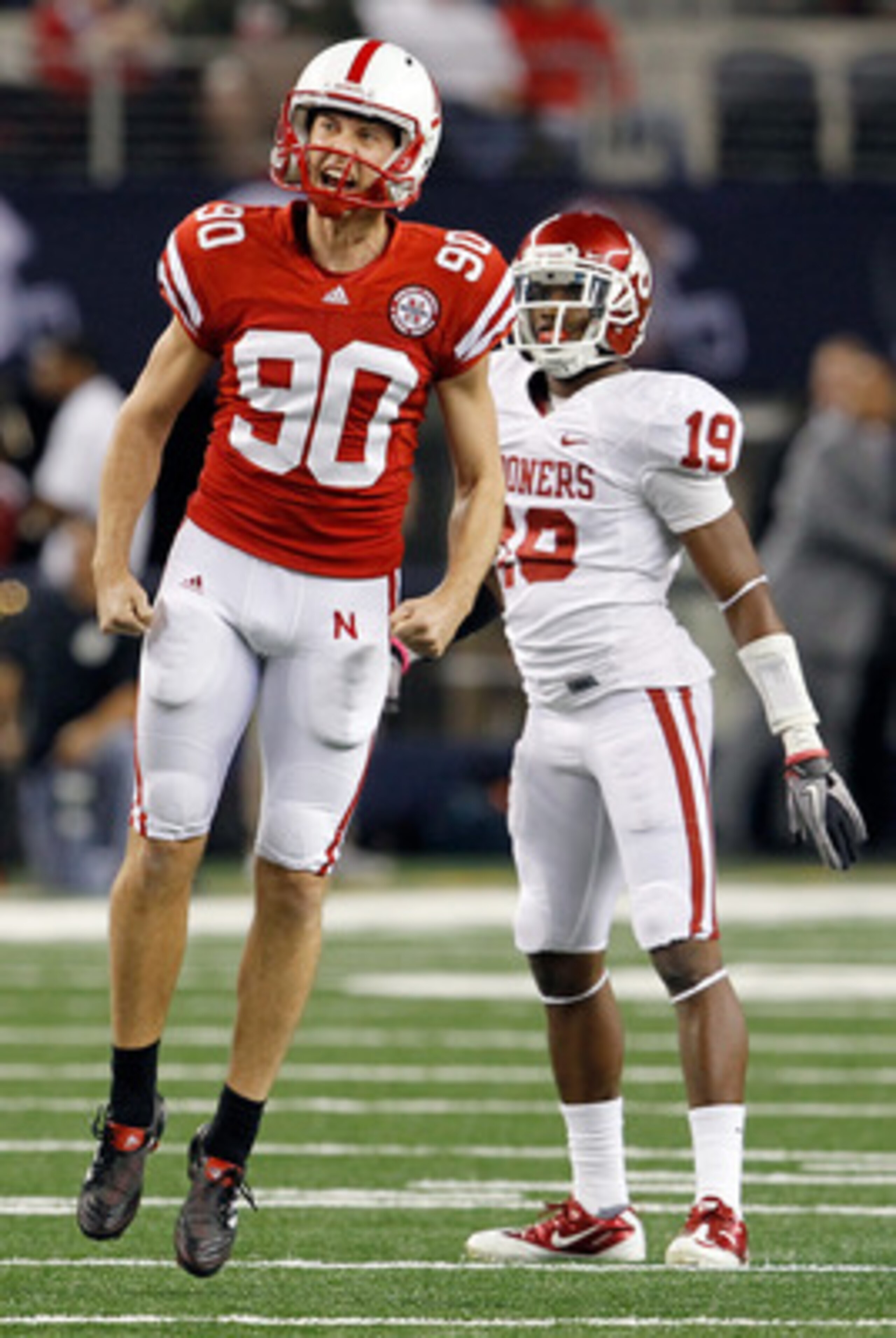 ARLINGTON, TX - DECEMBER 04: Kicker Alex Henery #90 of the Nebraska Cornhuskers celebrates after kicking a field goal against the Oklahoma Sooners at Cowboys Stadium on December 4, 2010 in Arlington, Texas. (Photo by Tom Pennington/Getty Images) ARLINGTON, TX - DECEMBER 04: Kicker Alex Henery #90 of the Nebraska Cornhuskers celebrates after kicking a field goal against the Oklahoma Sooners at Cowboys Stadium on December 4, 2010 in Arlington, Texas. (Photo by Tom Pennington/Getty Images)