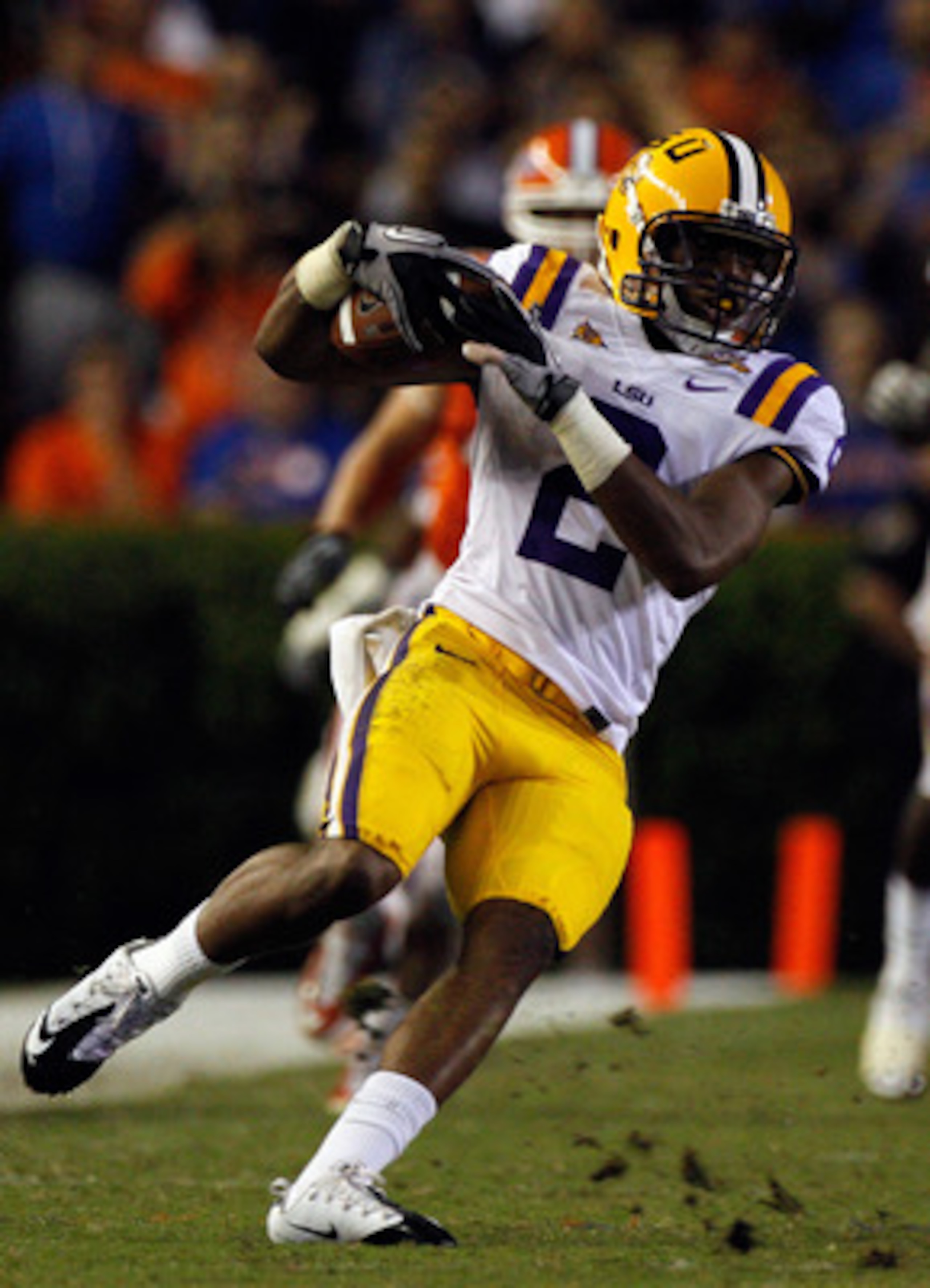 GAINESVILLE, FL - OCTOBER 09:  Rueben Randle #2 of the Louisiana State University Tigers runs after making a reception against the Florida Gators during the game at Ben Hill Griffin Stadium on October 9, 2010 in Gainesville, Florida.  (Photo by Sam Greenw