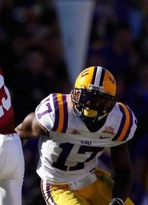 BATON ROUGE, LA - NOVEMBER 06:  Darius Hanks #15 of the Alabama Crimson Tide avoids a tackle by Morris Claiborne #17 of the Louisiana State University Tigers at Tiger Stadium on November 6, 2010 in Baton Rouge, Louisiana.  (Photo by Chris Graythen/Getty I