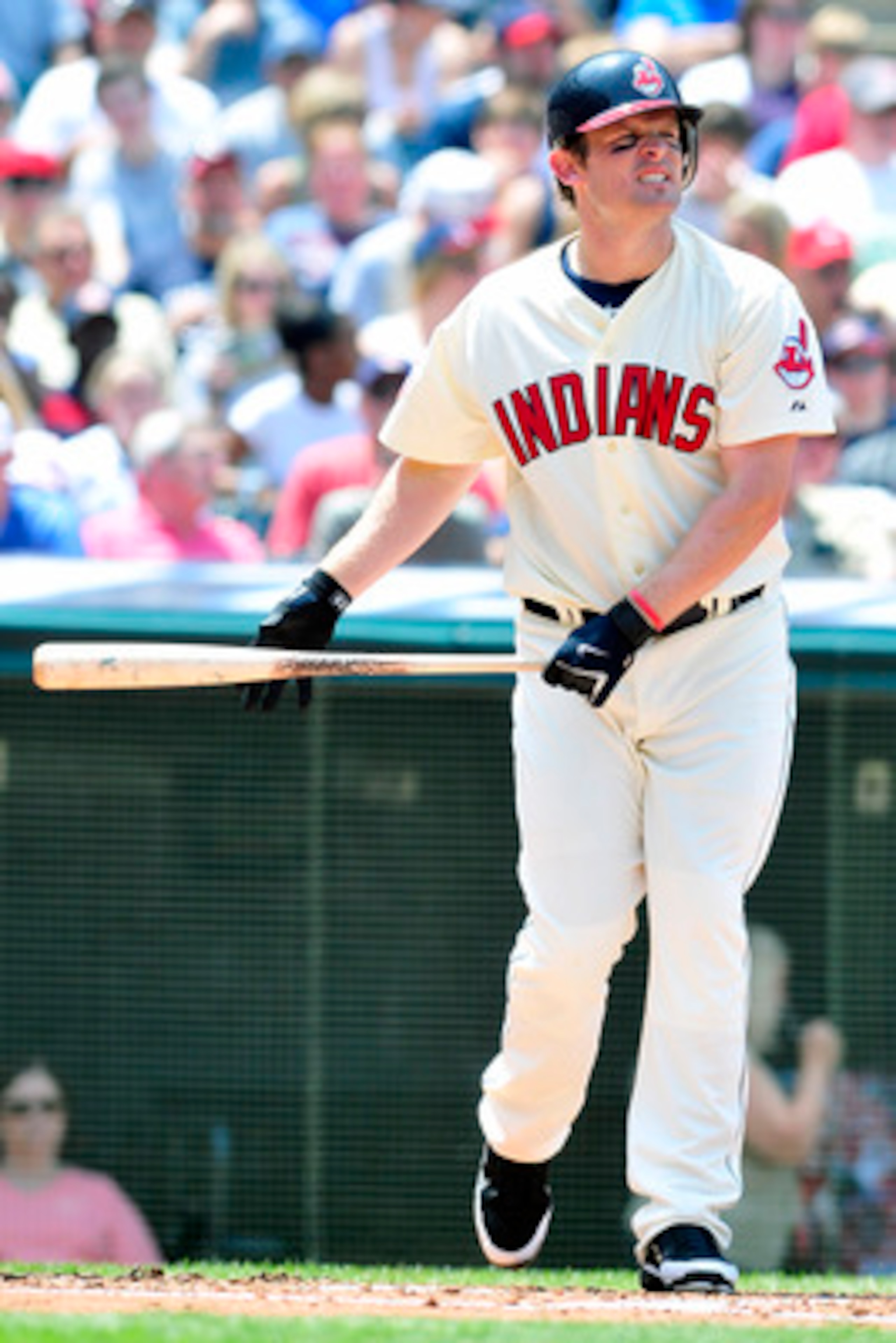 CLEVELAND, OH - JUNE 5: Austin Kearns #26 of the Cleveland Indians reacts after a strike during the third inning against the Texas Rangers at Progressive Field on June 5, 2011 in Cleveland, Ohio. (Photo by Jason Miller/Getty Images)