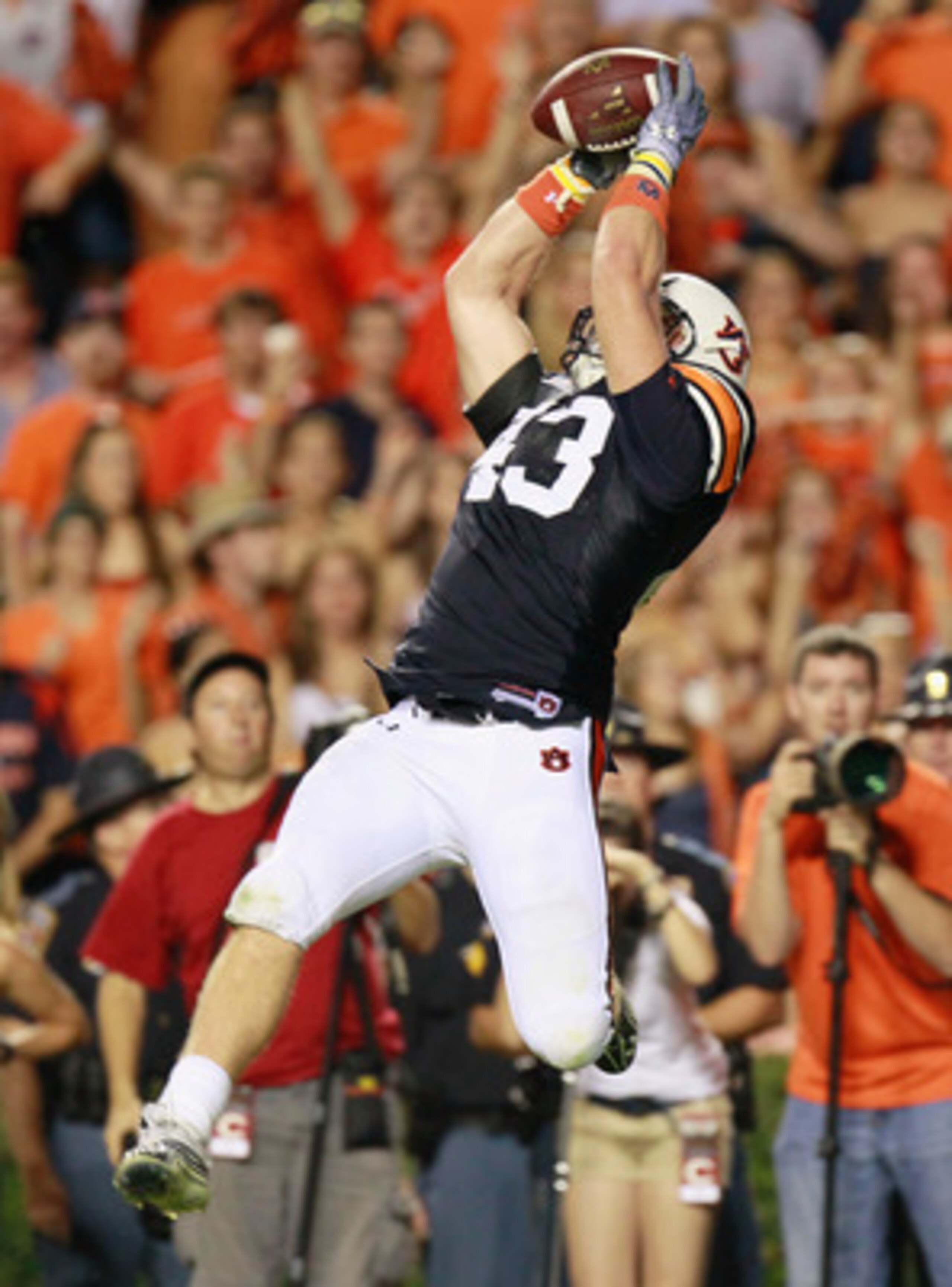 AUBURN, AL - SEPTEMBER 25:  Philip Lutzenkirchen #43 of the Auburn Tigers pulls in this go-ahead touchdown reception against the South Carolina Gamecocks at Jordan-Hare Stadium on September 25, 2010 in Auburn, Alabama.  (Photo by Kevin C. Cox/Getty Images