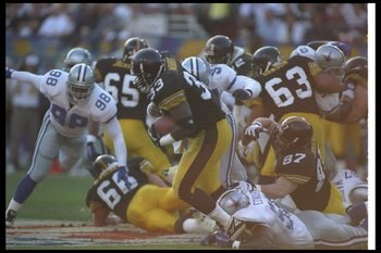 28 Jan 1996:   Running back Bam Morris of the Pittsburgh Steelers runs  as linebacker Godfrey Myles of the Dallas Cowboys tries to tackle him at Super Bowl XXX at Sun Devil Stadium in Tempe, Arizona.  The Cowboys won the game 27 - 17. Mandatory Credit: Ri