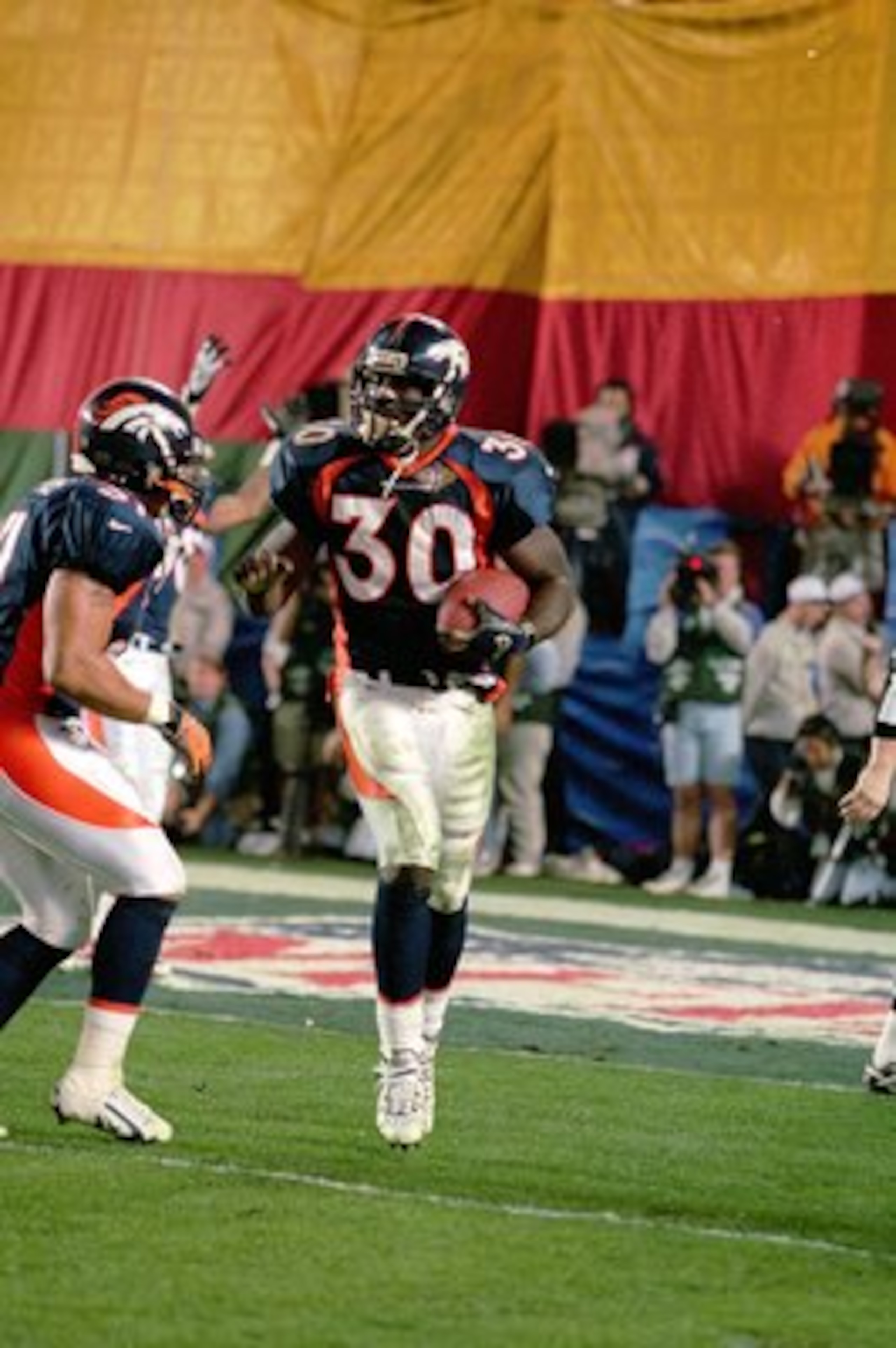 25 Jan 1998:  Terrell Davis #30 of the Denver Broncos celebrates scoring a touch down during the NFL Super Bowl XXXII Game against the Green Bay Packers at the Qualcomm Stadium in San Diego, California. The Broncos defeated the Packers 31-24. Mandatory Cr