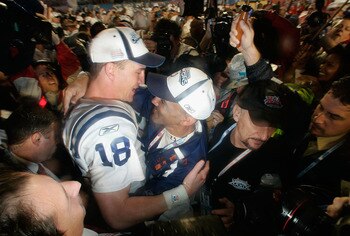 MIAMI GARDENS, FL - FEBRUARY 04:  Quarterback Peyton Manning #18 of the Indianapolis Colts hugs head coach Tony Dungy as they celebrate their 29-17 win against the Chicago Bears in Super Bowl XLI on February 4, 2007 at Dolphin Stadium in Miami Gardens, Fl