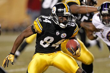 PITTSBURGH, PA - JANUARY 15:  Wide receiver Antonio Brown #84 of the Pittsburgh Steelers runs with the ball after a catch against the Baltimore Ravens in the AFC Divisional Playoff Game at Heinz Field on January 15, 2011 in Pittsburgh, Pennsylvania.  (Pho