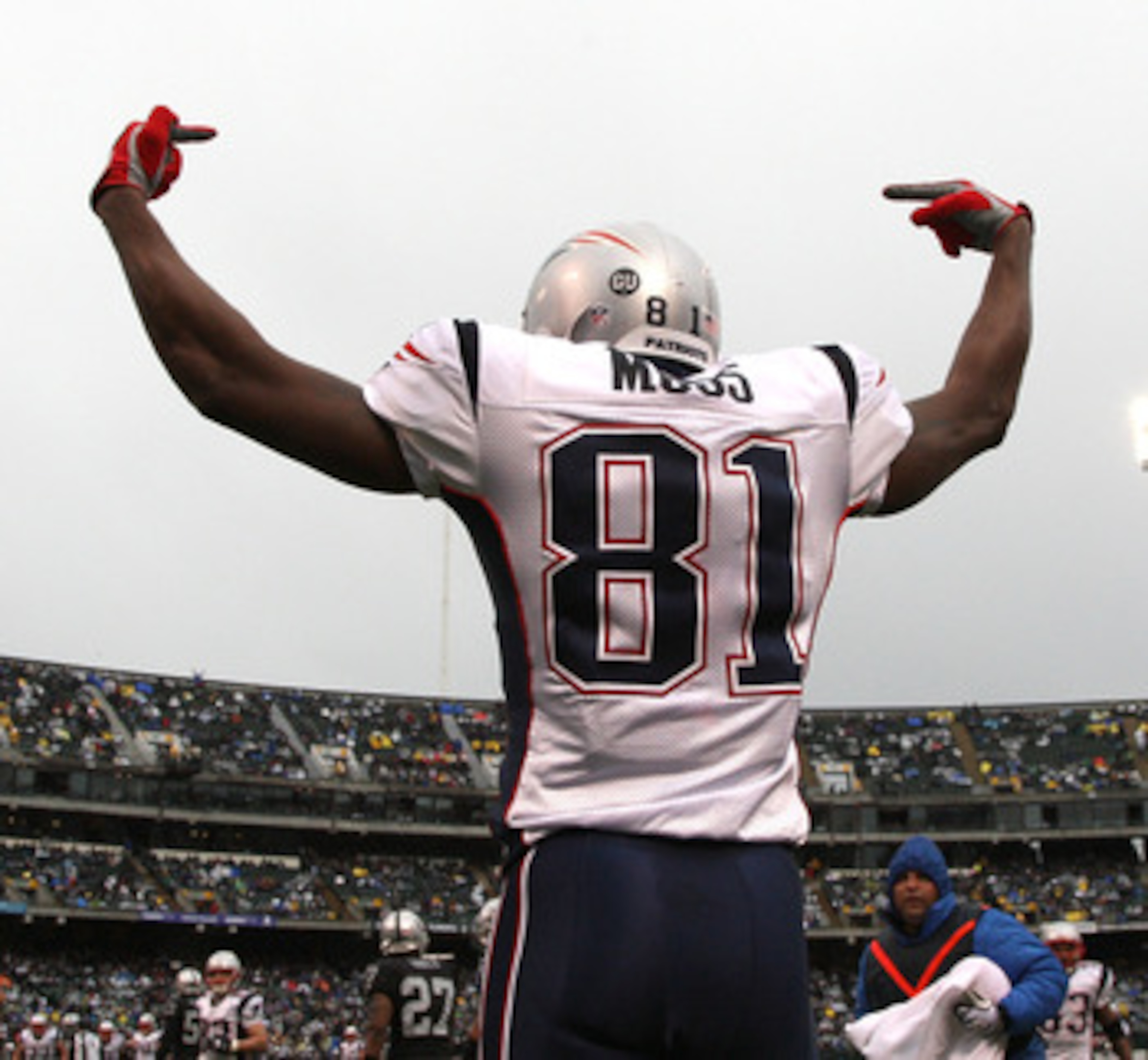 OAKLAND, CA - DECEMBER 14:  Randy Moss #81 of the New England Patriots celeberates after scoring a touchdwon against the Oakland Raiders during an NFL game on December 14, 2008 at the Oakland-Alameda County Coliseum in Oakland, California.  (Photo by Jed
