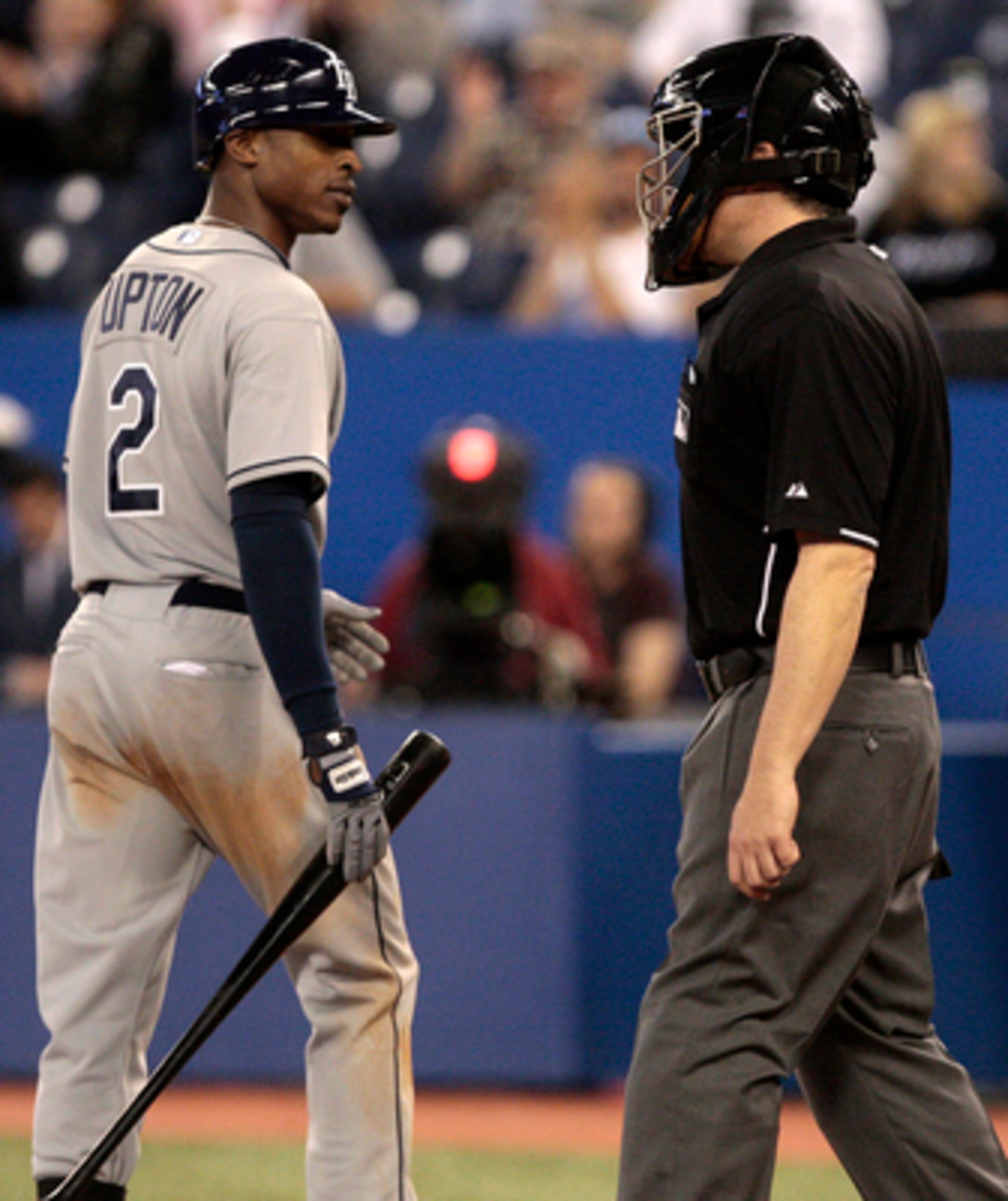 TORONTO, CANADA - MAY 18: B.J. Upton #2 of the Tampa Bay Rays argues a strike call with Tim Welke during MLB action against the Toronto Blue Jays at the Rogers Centre May 18, 2011 in Toronto, Ontario, Canada. (Photo by Abelimages/Getty Images)